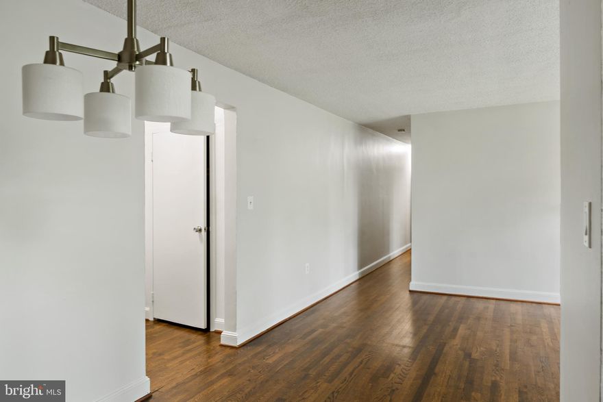 Live in the gorgeous Cabin John neighborhood with this jewel at a hard to find price. Condo's go fast here. It's a Spacious End-unit two bedroom one bath condo (second largest in the building) with beautiful views. And it's move-in ready with brand new renovations - stainless steel appliances, new finished countertops, new light fixtures and of course fresh paint and hardwood flooring throughout. The perfect home or investment property with Rock Bottom condo fees, in a pet-friendly building and a Lead-Free certificate included for less maintenance and worries! Comes with 2 assigned tandem parking spaces, dedicated storage space and in-building laundry facilities. Centrally located right up the street from DC straight through C & O canal or MacArthur, a stone's throw down seven locks to Bethesda, and just few brief minutes drive to the beltway.