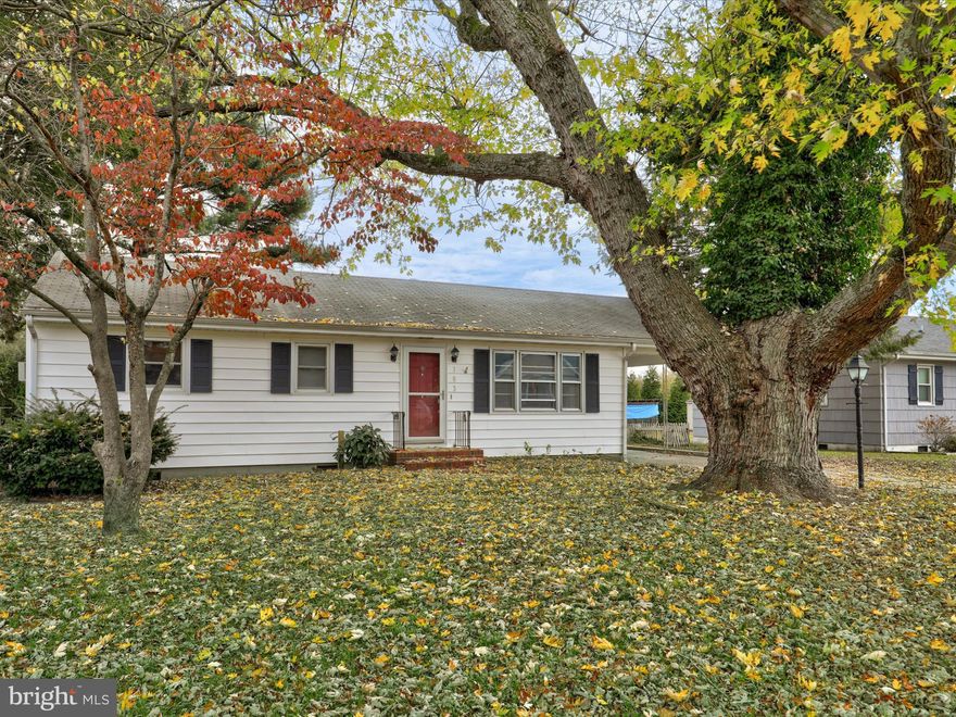 Excellent opportunity!  This charming 1950s rancher in Salisbury sits on a beautiful lot with mature trees and a large backyard.  Inside, the original hardwood floors have recently been refinished, and the bathroom has received a modern upgrade.  In the kitchen, the cabinetry provides ample storage and, the microwave and stove/oven are brand new.  A mud room between the carport and kitchen offers great space for laundry.  With a little TLC, this could be a fantastic primary home or investment property.  Don't miss your chance to see this gem, schedule your appointment today!