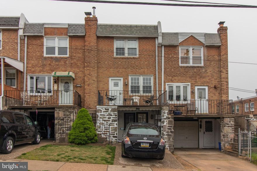 Excellent value in Roxborough! Looking for off street parking and a finished basement? Here is your home! This well maintained townhome  boasts 3 bedrooms, 2 full baths, a FINISHED BASEMENT and OFF STREET PARKING! Enter through the option of a full, finished walk-out basement or walk through the porch into your spacious living room. Natural light oozes through the large windows into your living room. Open first floor plan with separate dining area just off of the kitchen. Kitchen has a small breakfast bar, abundant cabinetry, and more natural light. Exit to a large rear deck and backyard ideal for outdoor entertaining, BBQ, or gardening. Take the stairs to find a tiled hall bathroom with skylight as well as 3 generous bedrooms all with large closets. Full finished basement complete with a full bathroom and utility area completes the home. Take a look at the virtual tour here:  https://www.youtube.com/watch?v=38K6hNr39yU&feature=youtu.be