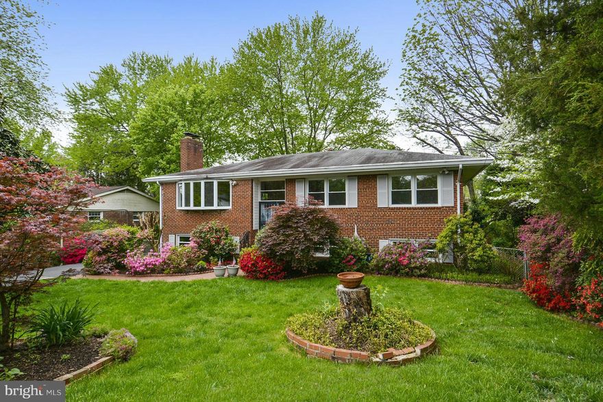 Great Home on Gorgeous Lot w/ 3 Bedrooms & 2 Baths on Main Level, including MBR w/MBA, plus 2 BR/Dens & 3rd Bath on Lower Level. Large Updated Eat-In Kitchen w/ Sliding Door to Deck & Stairs to Lower Deck. Spacious L-shaped LR/DR w/FPL & Bay Window. Daylight Rec Rm w/FPL & Sliding Door to Deck, Patio & Big Fenced Backyard. Refinished HDWDS on Main Level, Dbl-Pane Windows, New Carpet & Fresh Paint.