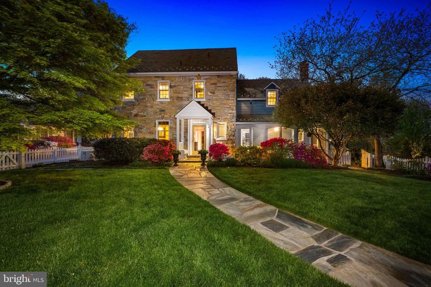 Tucked at the end of a quiet cul-de-sac, this 1939 center hall Colonial offers a rare combination of timeless architecture and thoughtful livability. Originally built by a builder for his own family, the home reflects a level of craftsmanship and intention that stands apart.

A grand entryway sets the tone, leading into interiors rich with classic detail and everyday comfort. Random-width wood floors, four masonry fireplaces, and well-proportioned rooms reflect the home’s timeless design, with natural light bringing a warm, easy feel to every space. The updated kitchen is both functional and inviting, featuring granite countertops, stainless steel appliances, recessed lighting, a beadboard ceiling, and a spacious breakfast nook with built-in seating. Just beyond, a cozy den offers a relaxing retreat with wood-paneled walls and one of the home’s four fireplaces. A screened porch just off the living room provides a quiet place to start or end the day.

Upstairs, the owner’s suite offers a true sense of retreat with two closets and an en-suite bath. Two additional bedrooms are located on this level, many featuring built-ins and charming window seats with storage throughout. The uppermost level provides a private fourth bedroom with a full bath—ideal for guests, a home office, or additional living space.

The lower level adds flexibility with a comfortable recreation room centered around another fireplace, along with built-ins, plenty of storage, and a dedicated laundry area.

Outdoor living is just as compelling. A beautifully designed in-ground pool anchors the fenced backyard, complemented by a raised flagstone patio and a fully equipped outdoor kitchen with a built-in grill connected to the home’s gas line, beverage fridge, sink, and cooktop—ideal for entertaining or enjoying quiet evenings at home. A pool house with a changing area and half bath adds convenience, while both the front and backyard are fully fenced for privacy. A long driveway accommodates up to five cars, includes an EV charger, and is supported by a whole house generator for added peace of mind.

Thoughtful updates over time include a slate roof replacement, dual HVAC system for improved efficiency and comfort, updated systems, and continued enhancements to the home’s landscaping, hardscaping, and pool—reflecting consistent care and long-term investment.

Ideally located just minutes from Del Ray, known for its local shops, dining, and neighborhood feel, with Old Town Alexandria and the waterfront approximately 12 minutes away. Everyday conveniences are close by as well, with Potomac Yard Shopping Center, home to Target, Best Buy, Barnes & Noble, and more, just 9 minutes from your doorstep. Commuters will appreciate proximity to the King Street Metro and Alexandria Amtrak station, along with quick access to Washington, D.C., the Pentagon, and National Landing.
With its slate roof, architectural character, and enduring appeal, this is a home that has been thoughtfully maintained and enjoyed over time, ready for its next chapter.