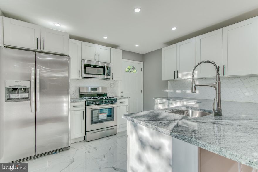 Great new rehab in Lauraville. Whole house had been updated. Brand new kitchen with stainless steel appliances and granite countertops. Hardwood flooring, beautiful trim work, and bright light filled open floor plan. Easy one level living with a fully finished basement and a great backyard, just in time for the warm weather.