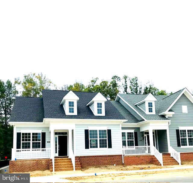 Premium Lot/ End Unit Home! Backs to forest conservation! Enjoy tranquility & peace on your deck OR your private brick paver front porch as this model features on all Augusta homes. The Augusta comes standard with 3 bedrooms & 3 full bathrooms. This one level living villa showcases majority of your home as soon as you walk through your front door. Designer Aristokraft Sarsaparilla Cabinets, Stylish Santa Cecelia Granite to compliment the cabinet and luxury vinyl flooring throughout main level except bedrooms and bathrooms, Level 2 Upgraded tile in Master Bath, Spacious Lower-Level Bedroom 3 with Full Bath, Finished Recreation Room, Open Concept Floorplan. Every home receives a deck and 2 car garage. The Villages of Steeple Chase is an amenity rich community including swimming pool, clubhouse with fitness center, playgrounds, fountains, and scenic trails. Carefree Maintenance community which offers lawn mowing, annual gutter cleaning, snow removal of lead walks, leaf cleanup and more included in HOA. $10,000 closing cost assistance using preferred lenders, Immediate Delivery, $10,000 EMD, please be pre-approved with one of our preferred lenders. Co-Op $10,000 flat fee.