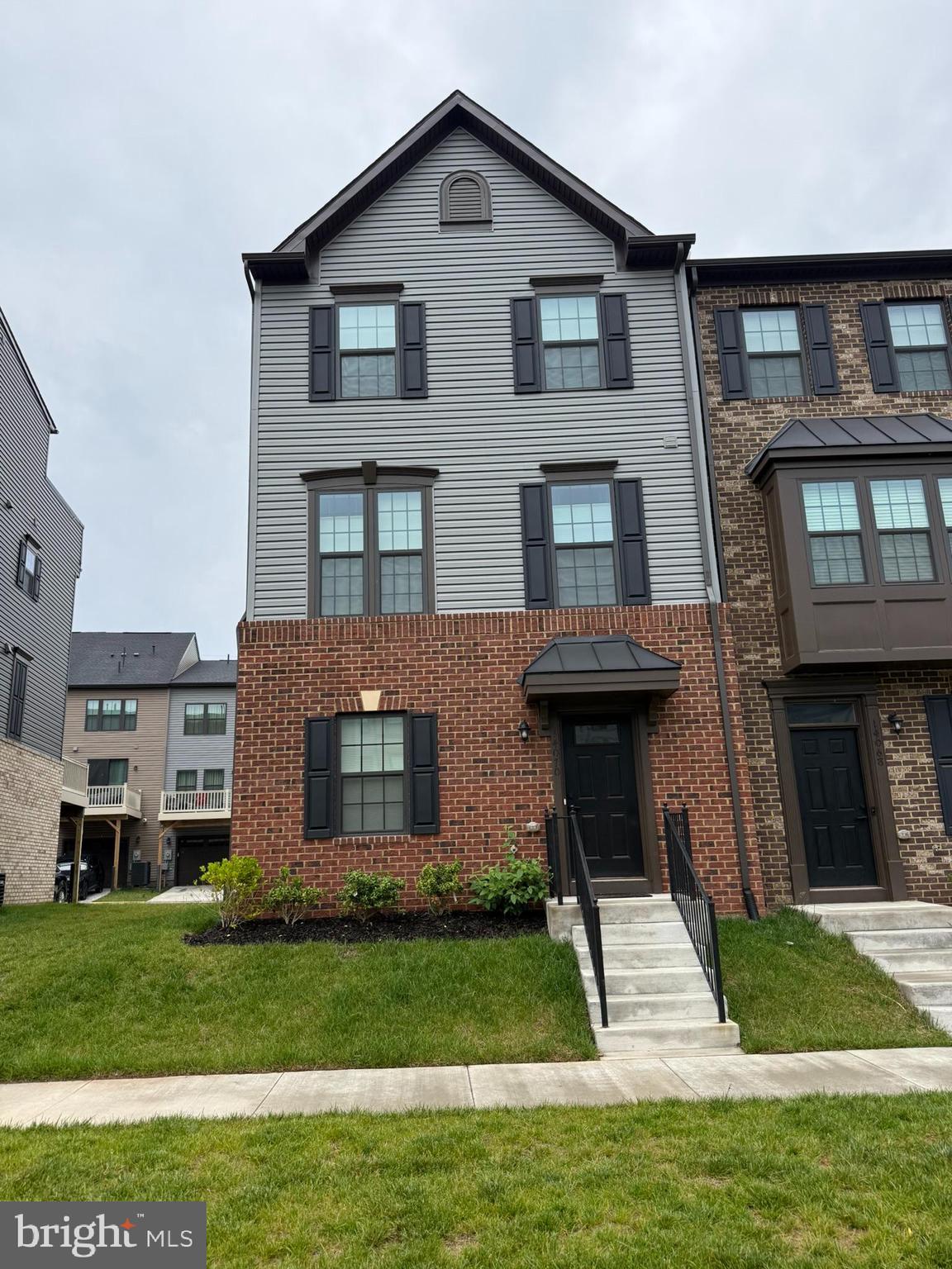 Welcome to 14070 Sunrise Valley Drive—where modern elegance meets everyday functionality in this newly built 2024 end-unit Strauss model townhome. Spanning four spacious levels and 2,480 square feet, this 5-bedroom, 4.5-bath home is designed for elevated living in the heart of Herndon. The open-concept main level features a chef-inspired kitchen with stainless steel appliances, granite countertops, and a central island that seamlessly connects to the bright living and dining areas—ideal for entertaining. Natural light pours into every corner, extending to the oversized deck and private terrace for effortless indoor-outdoor living. The entry-level offers a private bedroom and bath—perfect for guests or a home office—while the upper levels boast a luxurious primary suite with dual vanities, a walk-in shower, and ample closet space, along with additional bedrooms, full baths, and a convenient laundry room. An attached two-car garage adds practicality, and the home’s prime location within the Foster’s Glen community offers scenic walking trails, pet friendly, exercise stations, playgrounds, and a peaceful pondside pavilion. With easy access to Route 28, the Dulles Toll Road, I-66, Dulles Airport, and the nearby Innovation Center and Herndon Metro Stations, this home combines comfort, connectivity, and convenience—making it a perfect place to live, work, and unwind.
You must park in the sellers driveway or the visitor parking lot on Velocity.