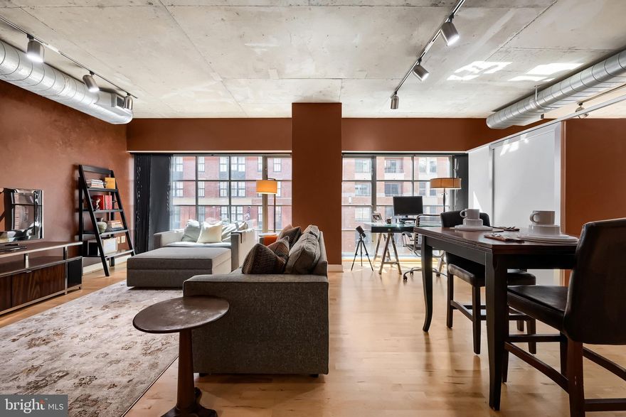 Welcome to Eight50 Aliceanna, a sophisticated one bedroom, one bath condominium in the heart of Harbor East offering over 1,000 square feet of well designed living space. This NY-style loft features high ceilings, hardwood floors throughout, and expansive walls of windows that bring in abundant natural light and showcase attractive city views. The open concept living and dining area connects seamlessly to the kitchen, which is equipped with stainless steel appliances, granite countertops, and a breakfast bar, making it ideal for both everyday living and entertaining. The spacious primary bedroom includes two closets, while the well appointed bathroom features a walk in shower with clean, contemporary finishes. A highly desirable parking space located on the same floor as the residence adds exceptional convenience. This boutique condominium is ideally situated just steps from Harbor East’s restaurants, boutique shopping, Whole Foods, Starbucks, the waterfront, the Inner Harbor, and vibrant city amenities. The condo fee includes air conditioning, heat, water, and trash offering a low maintenance lifestyle in one of Baltimore’s most sought after neighborhoods.