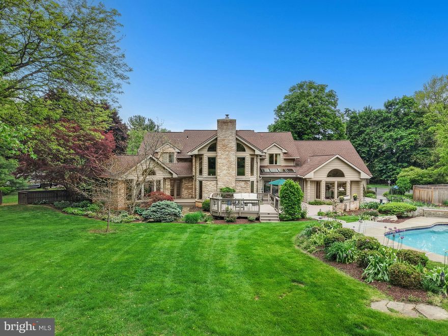 Set at the end of a picturesque private lane, on a quiet cul de sac, this stunning home boasts over 8,300 square feet of living space and may well be one of the best houses you have ever seen.
     Walls of glass bathe the first floor in light and showcase a magical backyard oasis, with private pool and luscious landscaping. The views and amenities from every room are amazing. An impressive two-story family room is anchored by a commanding floor-to-ceiling stone fireplace and walls of cherry cabinetry. The gourmet kitchen is a breathtaking blend of aesthetics and functionality, with abundant sunshine as backdrop for glass-front cabinetry and a lovely breakfast area with skylights and cathedral ceiling. A first-floor master suite has luxurious bath and adjacent office with cherry cabinetry.
     Upstairs, cleverly designed bedroom suites of 4 bedrooms, allow family and guests to feel indulged with space and privacy, while a fully finished lower level offers a variety of rooms for every additional hobby. Close to Historic Bethlehem and the Lehigh Valley’s finest Colleges and Universities, Bridle Path is a one-of- a-kind property in an exceptional location.