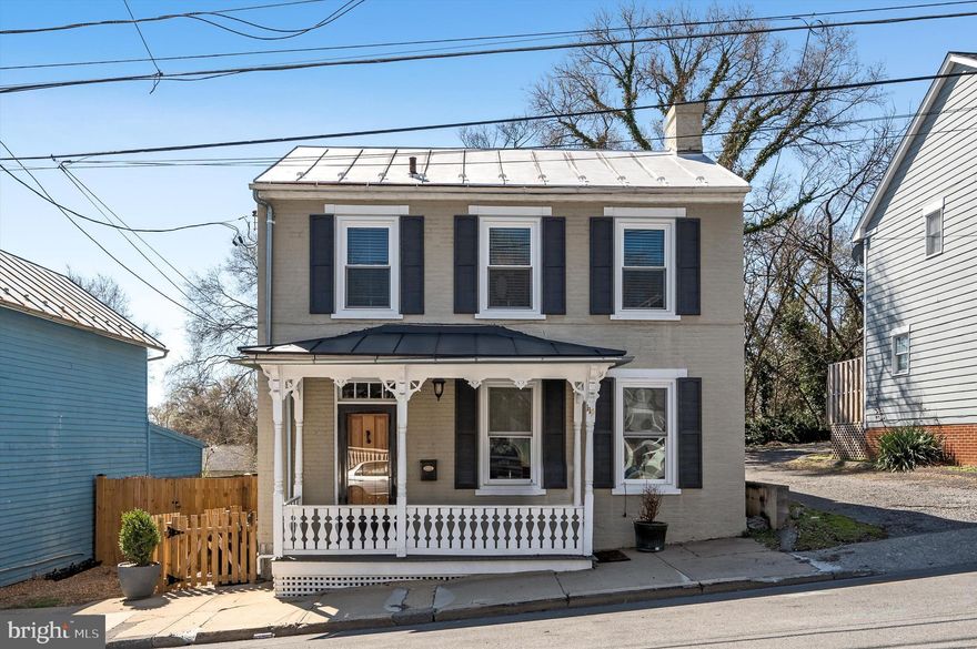 Nestled in the heart of historic downtown Winchester, this beautifully updated 2 bed, 2.5 bath colonial seamlessly blends modern convenience with timeless charm. Just steps from parks, dining, shopping, and the vibrant Old Town Walking Mall, this home offers the perfect blend of city living and cozy retreat.
Inside, you'll find maintained original details alongside stylish updates, creating a warm and inviting atmosphere. The thoughtfully updated kitchen boasts modern finishes while preserving the home's classic character. The living and dining areas are perfect for entertaining.  
Enjoy multiple outdoor spaces, including a charming front porch, a private patio, and a large, beautifully landscaped backyard—a rare find in downtown Winchester! One off-street parking spot is available for added convenience .Don't miss this opportunity to own a piece of Winchester’s history with all the modern amenities you desire. Schedule your showing today!