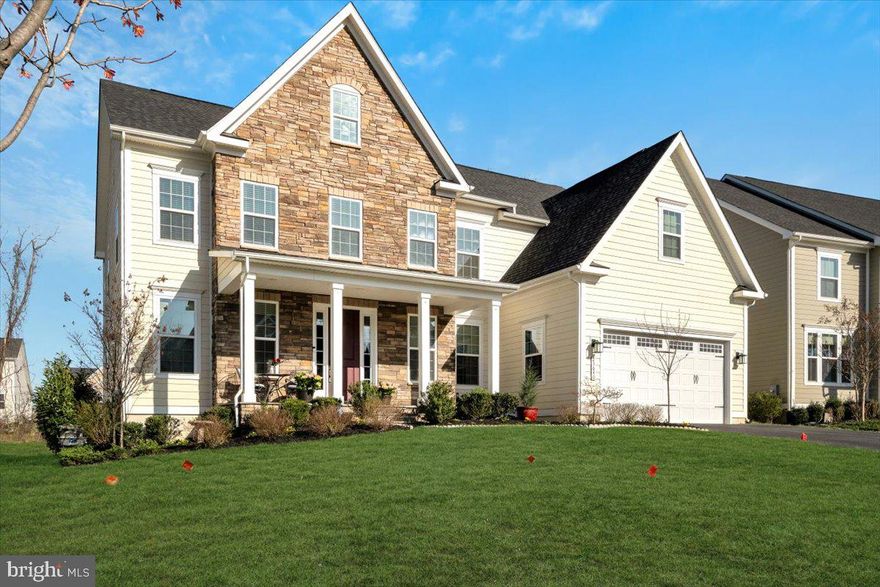 Welcome To Willowsford   This Multigenerational NV Homes Radford Model With Double Ceilings  **Main Level Bedroom/Bathroom, and a Basement Bed Bath ** is A Masterpiece Located In The Prestigious Willowsford Community, Offering A Perfect Blend Of Rural Charm And Modern Amenities.   This Expansive Home Boasts 6 Bedrooms And 5 Full Bathrooms, Including Ideal Walk-up Bsmt, With About 5,500 Sq Ft, A Flat Yard & Extended Deck & 2 Garages  Step Inside To Discover A Grand 2-Story Family Room With An Elegant Overhang From The Bedroom Level, Creating A Dramatic And Open Atmosphere.   The Main Level Features An Extended Area With A Large Dining Room, A Spacious Library, And A Kitchen That Is A Chef's Dream.   It Includes An Extended Large Island, Extra-Large Counter Space, A Tea Nook, And A Second Dining Area.   Abundant Windows Flood The Space With Natural Light, Highlighting The Beautiful Wood Floors Throughout The Main Level And Hallway.   The Dual Staircase Adds Both Elegance And Functionality, Leading To The Upper Level Where You'll Find **Each Bedroom Attached to Bathroom**A Luxurious Master Suite With A Large Tub, 2-Person Standing Shower, And A Dreamy Extra Large Closet.   The Princess Suite And 2 Other Bedrooms with Walk-in Closets A Jack And Jill Bathroom Provide Ample Space For Family Or Guests. **  Convenience Is Key With A Bedroom-Level Laundry Room Equipped With A Sink, Ironing Area, And Plenty Of Storage**.The Finished Walk-Up Basement Offers A Legal Bedroom And Bathroom, A Full Kitchen/Bar With Lots Of Cabinets (No Permit for electric stove But Professionally Finished), A Sitting And Game Area, And Additional Storage Space.   Enjoy Outdoor Living With A Covered And Extended Deck Area For BBQ, Perfect For Entertaining Or Relaxing While Overlooking The Serene Tree Line.   Located Near Rt 50, Rt 15 Leading To Western Loudoun & Rt 234 Leading To PW County, 15 Minutes To The Dulles Airport, Next To Hartland / Lenah Mill & Brambleton, Local & Chain Shopping, Dining, And Commuting Routes, This Home Offers Rural-Style Living With Access To Modern Amenities.   Be Part Of The Vibrant Willowsford Community, With Access To Barns, Farms, And Wineries.   Commuter Buses To The DC Area Make This Location Ideal For Those Working In The City.   Comes With **Home Warranty * Sprinkler System * Security System**   Please Visit VIRTUAL TOUR Section To See Unlimited Amenities Link That Willowsford Offers  A 4,125-Acre Master-Planned Community Of 2,195 Single-Family Homes.   The Boat House At Willow Lake Is One Of Two Information Centers Used To Market The Community.   It Also Functions As A Traditional Boathouse, Providing Canoes And Kayaks To Residents If You Like To Stop By!