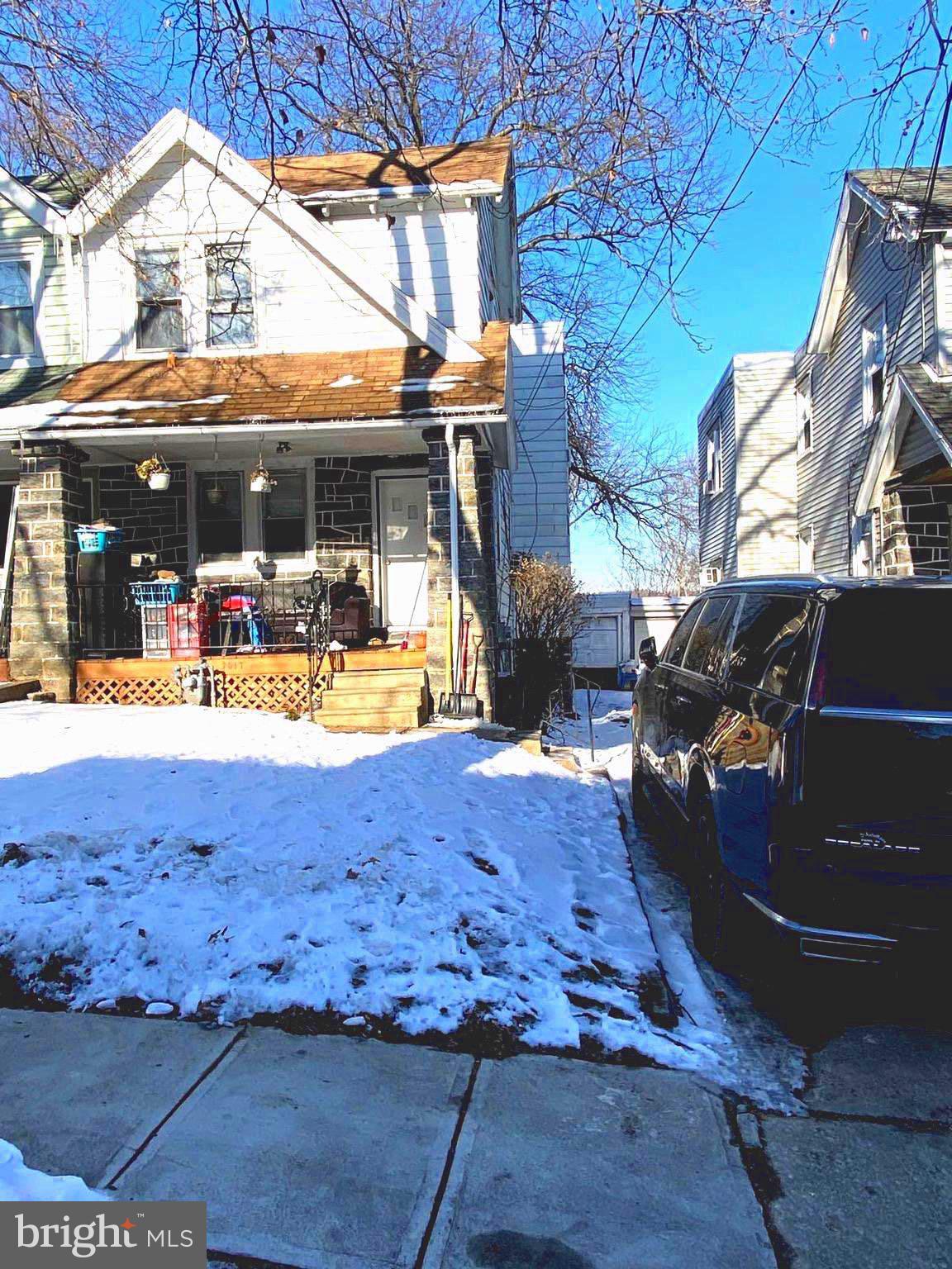 Large twin house with finished basement, rear deck, and one-car garage. first-floor living room dining room, and newer kitchen. The rear deck and large backyard have been recently installed, as well as newer kitchen cabinetry and countertops. Both bathrooms have been updated. From the kitchen, the back door leads you to the deck. The house has been updated The newly finished walkout basement has an updated bathroom and bedrooms, and the open space hall can be an office or family room and laundry area. Upstairs boasts generously sized 3 bedrooms and creates an inviting atmosphere for the family.. Additionally, this house is Situated in a desirable neighborhood, this home is close to schools, public transportation, shopping, and dining areas. providing ample outdoor space for relaxation and entertaining. Its prime location ensures easy access to Center City, making your commute a breeze. This home combines comfort, style, and convenience in a desirable setting.