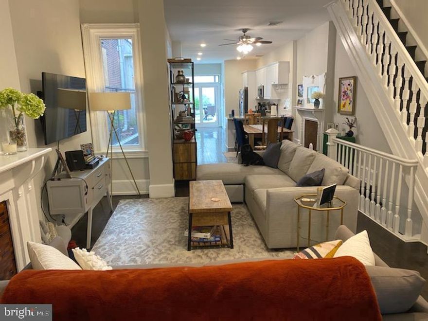 Amazing home in Fairmount with ONE CAR PARKING! Renovated with an open layout from the front door through to the living room, dining room, kitchen and out to the rear yard. The newer kitchen features granite counters, stainless steel appliances and a breakfast bar. There is a full bathroom on the main level. The sliders out to the yard make it a lovely entertaining area and/or perfect for enjoying your morning coffee and dinners al fresco. There are some beautiful original features like three mantels, built ins and large baseboards, original hardwood floors throughout, and 10 ft. ceilings on the main level. The second floor features 4 bedrooms and one full bathroom. The laundry is in the basement which is clean and dry and offers a walk out to the front DRIVEWAY so it's perfect for bike storage as well as other large items you may need to store. And of course, the one car driveway is perfect for easy living in the city. You won't have to search for parking when you get home from work! Walkable to The Philadelphia Museum of Art, Whole Foods, Target, CVS, The Barnes Foundation, tons of restaurants and shops throughout Fairmount, playgrounds, Boathouse Row for walking/biking tails and so much more. Schedule your showing today for this amazing home. Photos are from previous listing.