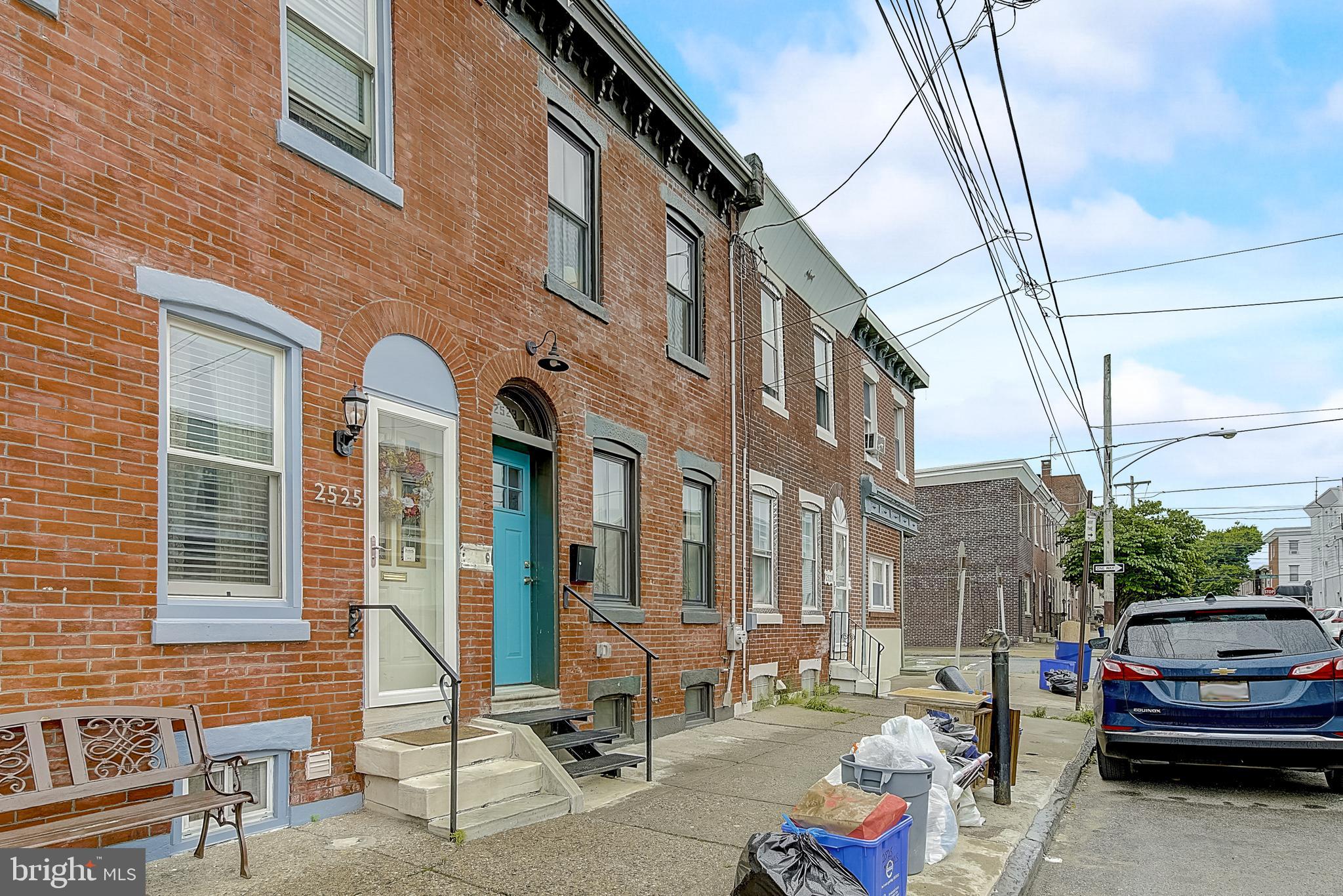 Charm, charm, and more charm in this Fishtown find! Welcome to 2523 Memphis St - this 2 bed, 3 bath (1 full, 2 half) home was completely renovated just a few years ago. On the first floor, you’ll find a gorgeous exposed whitewashed brick wall, a kitchen with beautiful quartz countertops and subway tile backsplash, hardwood floors, and a powder room. Upstairs 2 bedrooms await you along with a shared (and very roomy) full bathroom and stacked laundry just off the hall. In the primary bedroom, an original brick accent wall and closet adorn this light-filled room. The basement is finished complete with an additional powder room. Off the kitchen, you will find a fenced-in patio with a custom mural. Custom built-in shelving throughout the entire home makes for easy storage. Easy access to I-95, and close to so many bars and restaurants including Circles and Squares, Green Eggs Café, Memphis Taproom, and many, many more!