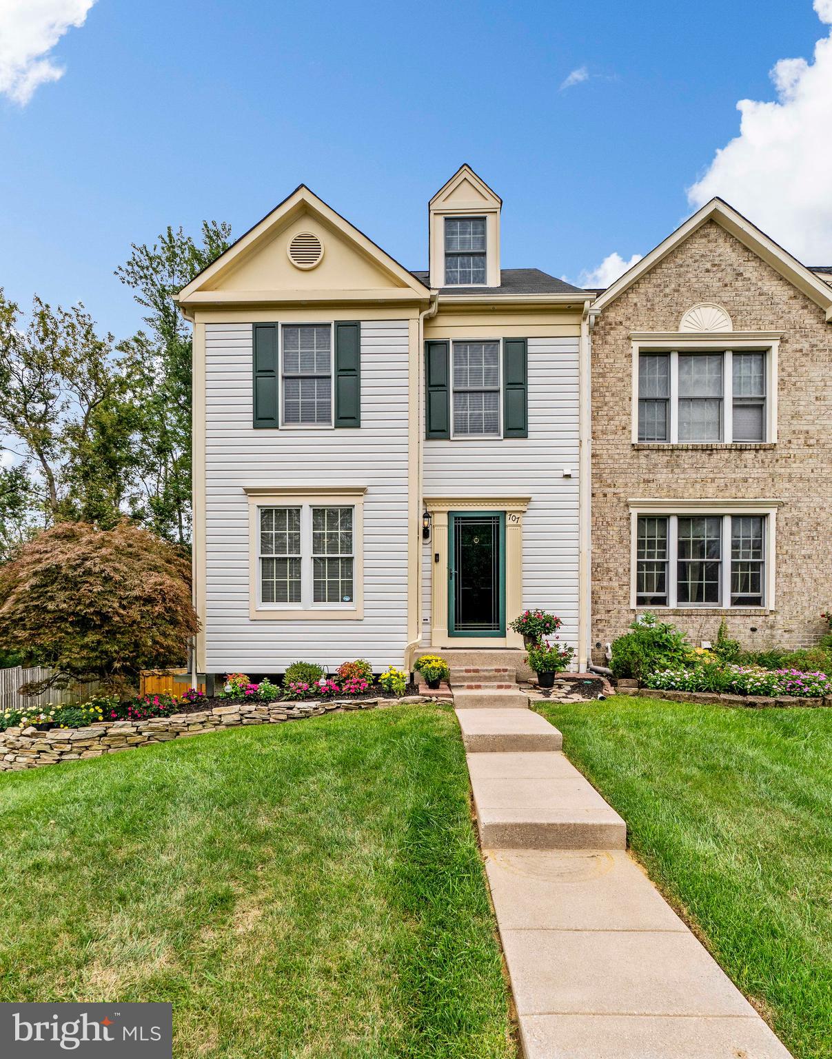 This meticulously maintained end of group townhome in the White Oak community is a MUST SEE! The large eat-in kitchen boasts custom made Maple cabinets with set touch drawer closure, granite countertops and backsplash, stainless steel appliances and hardwood flooring. The spacious Master bedroom also has a loft and extra storage space. The fully finished basement is complete with another full bath and extra room perfect for a den or guest bedroom. Enjoy quiet evenings sitting on the Mahogany "Geodeck" or on the lower level patio area. The oversized backyard is surrounded by a custom built fence.