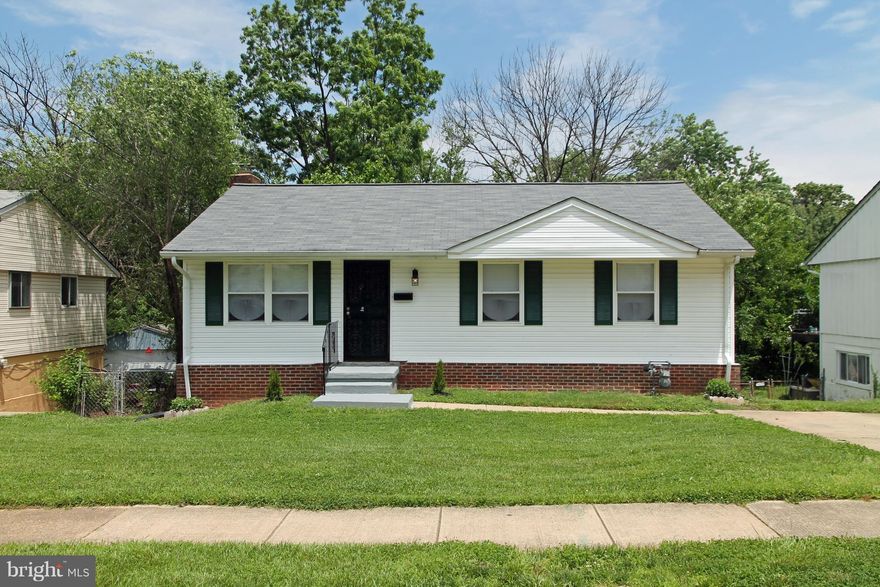 This cozy 3 Br, 1   Ba home is located in a convenient & quiet Glenarden comm w/off st parking.  Upper level freshened up w/new paint, carpet, inside doors & flooring. Roof is new & AC replaced.  Downstairs w/ finished rec rm featuring a brick Fp.  Walk out the basement onto a covered patio & enjoy the nice open back yard.  Move in ready! Room to add to 2 more Brs & make half to a full Bath.