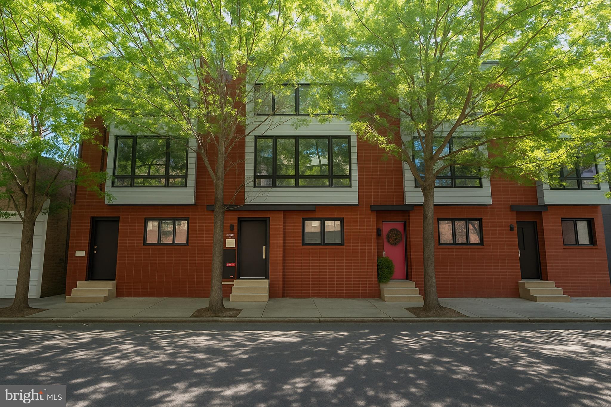 Stunning Contemporary Townhome with Two-Car Garage in the Heart of Northern Liberties!
Welcome to this beautifully designed 3-bedroom, 3.5-bath townhome offering modern luxury, exceptional space, and unbeatable location. Featuring two private garage parking spaces, two outdoor decks, and sleek contemporary finishes throughout, this home truly checks every box.
Venture inside to a spacious entryway complete with a custom built-in mudroom and an entire wall of closet space—perfect for staying organized. There is also a half bathroom, coat closet and a convenient access to the private two-car covered garage.
Up the first flight of stairs, the open-concept main level dazzles with natural light and seamless flow between the living, dining, and kitchen areas. The elegant dining space, surrounded by oversized windows, is ideal for hosting gatherings. The chef-inspired kitchen boasts high-end stainless-steel appliances, a wine fridge, modern range hood, breakfast bar seating, and stylish cabinetry. Relax in the sun-drenched living room featuring a cozy fireplace and direct access to a rear deck—perfect for grilling or entertaining outdoors.
The third floor offers two spacious bedrooms and two bathrooms, one being the primary suite. The luxurious primary bedroom includes a walk-in closet and a spa-like en-suite bath featuring dual vanities, a glass-enclosed shower, and a soaking tub. The additional bedroom is generously sized with large windows, ample closet space, and beautiful wood flooring.
At the top level, enjoy a versatile loft-style living area complete with a wet bar and access to a private rooftop deck offering stunning skyline views—ideal for relaxing or entertaining under the stars. Plus an additional bedroom and full hall bath perfect for owners and guests alike. The home also includes a stackable washer and dryer, dual newer HVAC systems and custom blinds throughout. Not to mention, the additional gravel space in the rear of the home perfect for overflow parking for owners and guests!
Located in the vibrant and sought-after Northern Liberties neighborhood, you'll be only a few blocks away from top-rated restaurants, coffee shops, boutiques, grocery stores, and public transportation. Whether you're enjoying brunch at cafe Le Maude or Honey's, relaxing in Liberty Lands park, or exploring the lively nightlife, everything you need is just outside your door.
Don't miss this opportunity to own a one-of-a-kind home in one of Philadelphia’s most exciting neighborhoods. Schedule your private tour today!