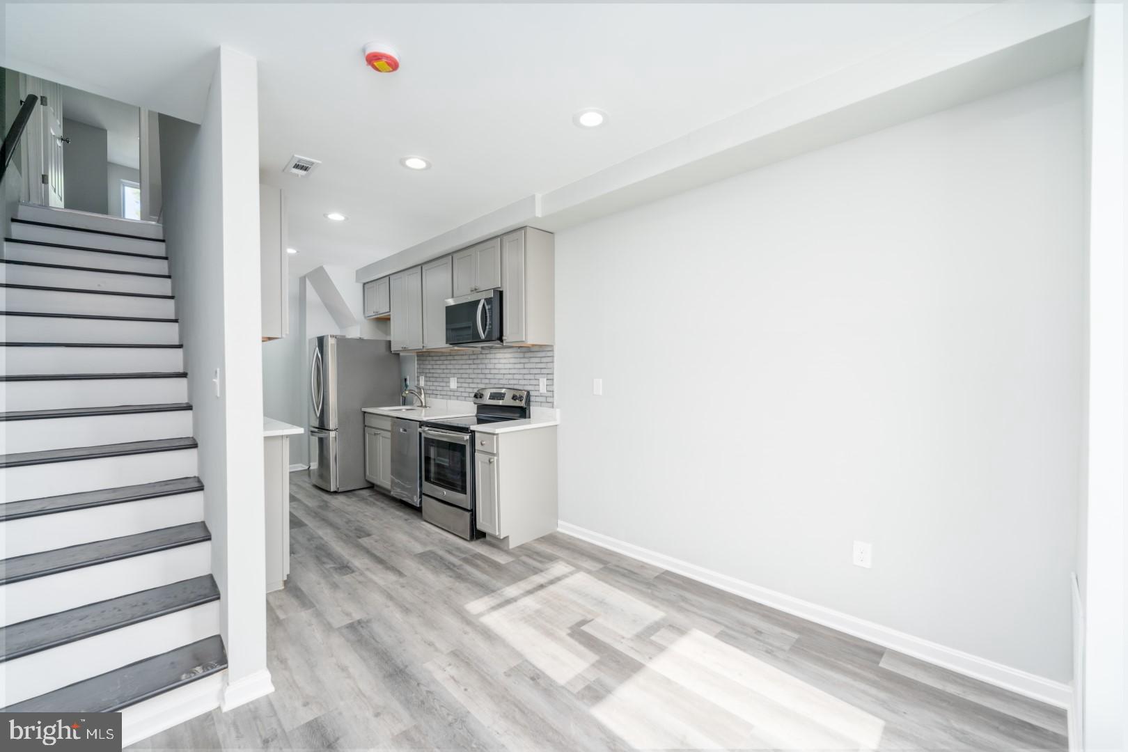 This fully renovated 3 Bed / 1.5 Bath rental features three finished levels with additional living space in the basement. Luxury vinyl plank throughout the main and second level with the 3rd bedroom and half bath on the main. Updates include brand new HVAC, new water heater, recessed lighting, quartz countertops and high-end cabinetry, stainless steel appliances, new vinyl windows, new roof, and fresh paint and trim. No expense has been spared! Pets on case-by-case basis. Washer and dryer in unit. Available immediately