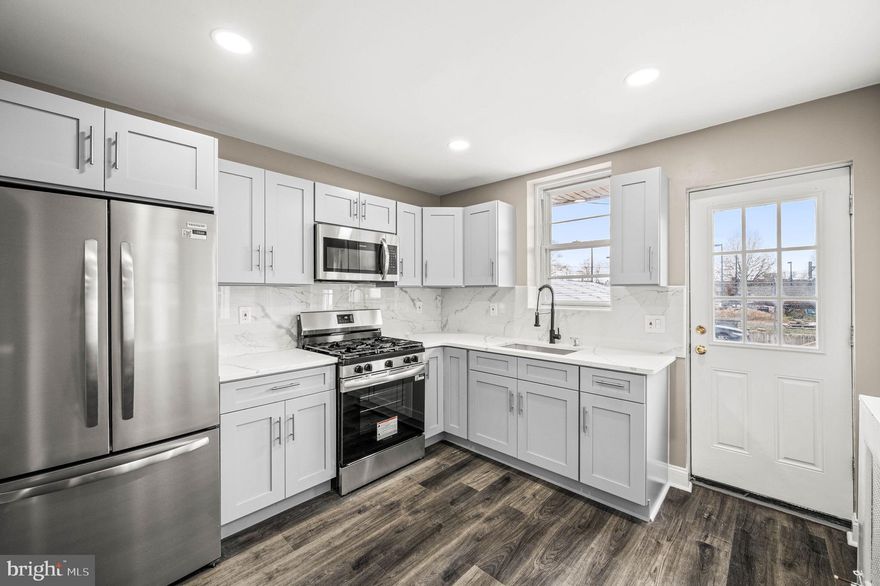 Welcome to this completely renovated home offering modern finishes and thoughtful upgrades throughout! Featuring brand-new flooring, recessed lighting, and an open-concept layout, this home delivers a bright, clean, and contemporary feel from the moment you step inside.

The brand-new kitchen is a true highlight, showcasing premium quartz countertops, stylish cabinetry, and ample space for cooking and entertaining. The home includes 3 bedrooms and 2 full luxury bathrooms, both finished with premium tiling and high-end touches.

A spacious 2-car cement driveway provides plenty of off-street parking. Outside, enjoy a welcoming front porch and front yard—perfect for relaxing or entertaining guests.

The basement is already underway and awaiting your final touches, offering great potential to be finished into additional living space, a home gym, or an entertainment area.

Move-in ready with room to customize, this home combines modern upgrades with future potential—don’t miss this opportunity!