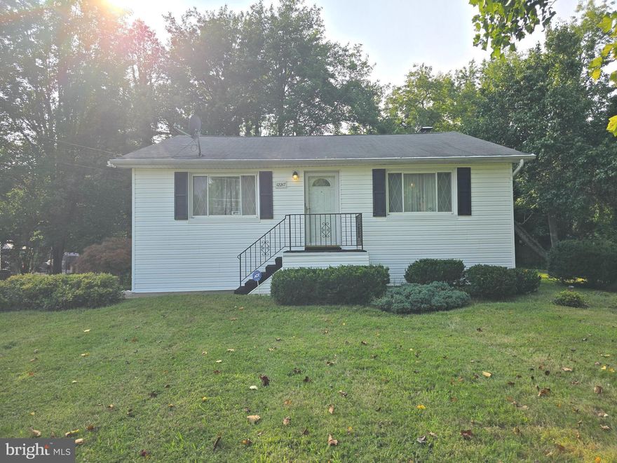Welcome to 12217 Old Fort Rd — Your Dream Home Awaits! Step inside this spacious and beautifully maintained 4-bedroom, 2-bath gem nestled in the heart of desirable Chapel Hill. From the moment you enter, you’ll be captivated by gleaming hardwood floors and a bright, airy living room that invites you to relax and unwind. The kitchen, bursting with potential, is ready for your personal style and culinary creativity. On the main level, discover three generously sized bedrooms and a full bathroom designed for comfort and convenience. The finished lower level is a true bonus — featuring a fourth bedroom, a second full bath, and a versatile rec room that’s perfect for guests, a home office, or your very own entertainment hub. Set on a picturesque, tree-lined lot, this home boasts a huge paved driveway providing plenty of parking and a spacious backyard ideal for gardening, outdoor play, or simply soaking up the serene surroundings. A handy storage shed adds extra functionality to this outdoor oasis. Location is everything! Enjoy a quick 3-minute drive to Olde Forte Village Shopping Center, Fort Washington Park & Ride, and Adventist HealthCare Fort Washington Medical Center. Plus, just 7 minutes to the beautiful Tantallon Marina for waterfront fun and relaxation. Easy commuter routes to DC make this the perfect blend of peaceful suburban living and city accessibility. Don’t miss your chance to own a home where comfort, convenience, and charm come together seamlessly! The property is in good condition and is being offered for sale in its current As Is condition, with no repairs or warranties by the seller.