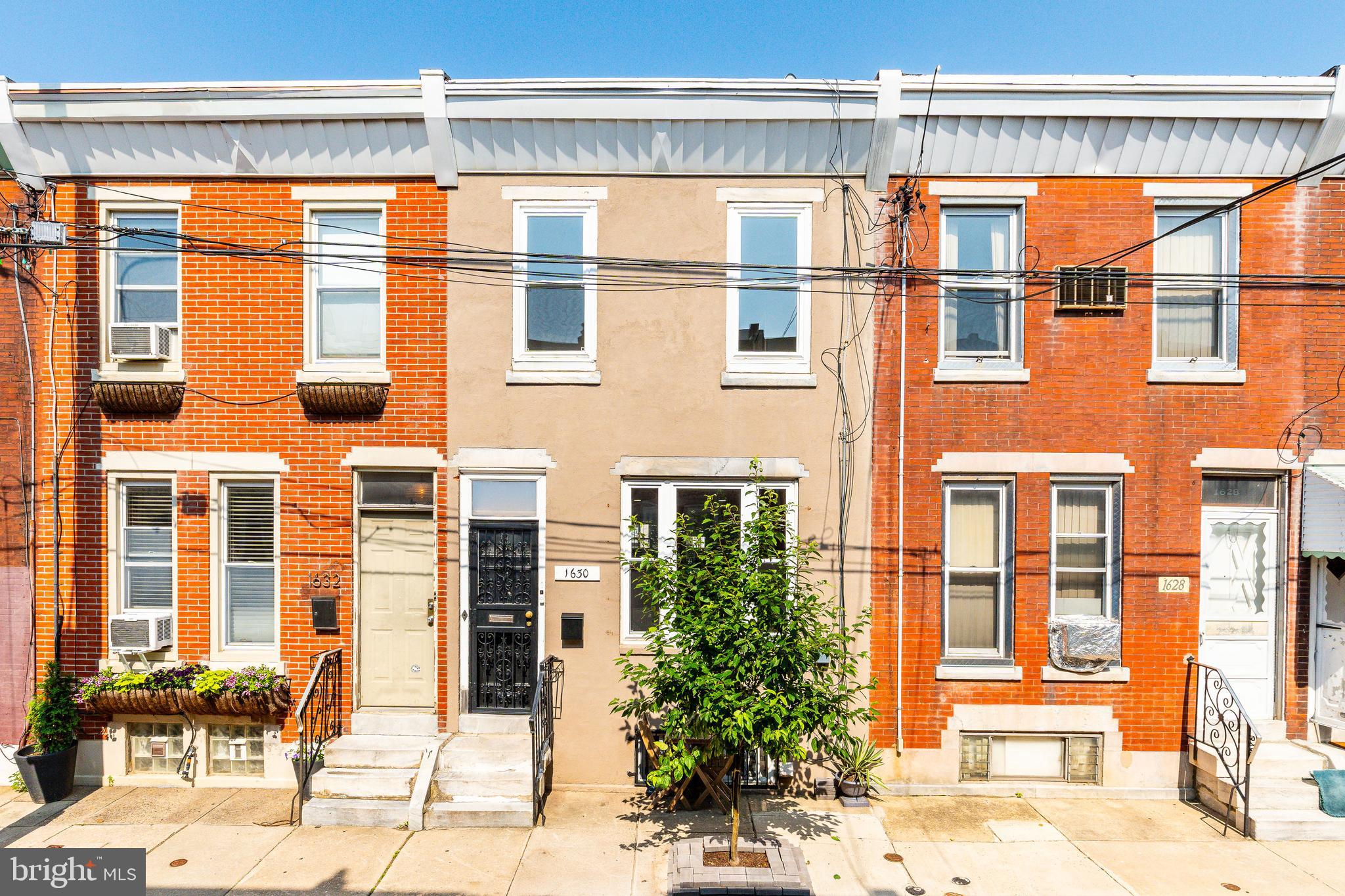 Welcome 1630 S Hicks Street! Your renovated 3-bedroom, 2-bathroom home perfectly blends modern style, thoughtful design, and incredible functionality. Step inside to a spacious living room filled with natural light, high ceilings, and plenty of space for a dining area—perfect for relaxing and entertaining. The modern kitchen features stainless steel appliances, soft-close cabinetry, and sleek quartz countertops, with direct access to your private outdoor patio—ideal for morning coffee, BBQs, or dining al fresco. Upstairs, you'll find three generously sized bedrooms, each with great closet space and natural light. A full hallway bathroom serves this level. The fully finished basement adds even more versatility with a second full bathroom, laundry area with washer and dryer, and a bonus room—perfect for a home gym, office, den, or extra storage.
Steps away from Broad St and all the city has to offer. Passyunk Ave is within walking distance. Supermarkets include Acme and Sprouts, and plenty of cafes, eateries, and stores in the area.
This move-in-ready home checks all the boxes—come see it for yourself!