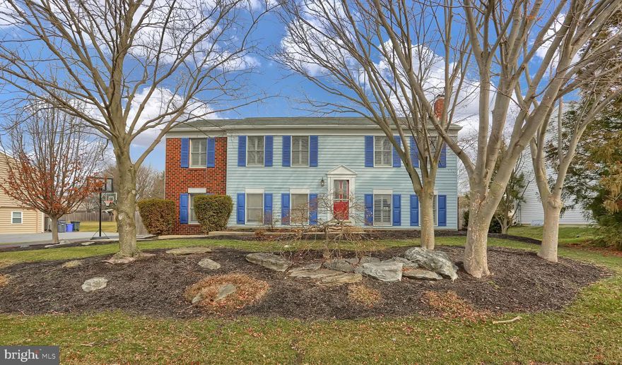 Newly updated beautiful Georgian bilevel with over 2000 sq ft of finished living space! Desired Penn Manor Schools in Manchester Village neighborhood. 3 large bedrooms, 2 full updated bathrooms, remodeled kitchen includes granite countertops and cabinets, built-ins, new recess lighting, breakfast bar, and large dining area. Brand new hardwood flooring throughout first floor and new carpet throughout, crown molding, dining area leads out to large deck. Lower level family room includes wood stove, new lighting, tons of built-in shelving, and large 3rd bedroom with full bath. Large walkout lower level leads to patio and flat yard completely fenced in. Absolutely beautiful! Great location to shops and restaurants in Willow Street, Strasburg, and downtown Lancaster. All major appliances and bathroom mirrors stay!