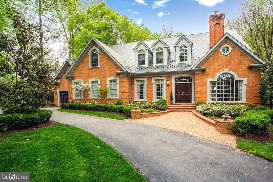 Located in sought after Langley Forest, this elegant colonial is sited on a flat 1/2 acre lot.  The interior is breathtaking! There are 5BR, 6BA, 2HB, newly renovated kitchen with two story family room, simply sensational windows, ELEVATOR, 4 finished levels, 8,500 s/f, gorgeous master suite w/ his and her closets, 3-car garage, mature gardens.