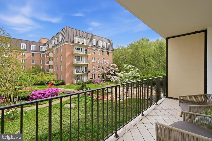 Bright & Spacious Condo in Chevy Chase | 2 Bed | 2 Bath | 1436 Sf | Private Balcony | 1 Parking Space | 2 Storage Units | Welcome to this large, two-bedroom condo with an open floor plan and 9 foot ceilings.  Enter through a gracious foyer into a large living room with adjoining private balcony overlooking the beautiful & quiet community gardens.  The large primary bedroom has a renovated ensuite bath with two separate sinks and a shower with frameless glass enclosure & bench.  Off the primary bath is a large walk-in closet.  The second bedroom in the unit can also serve as a den with double doors that open to the living area.  This bedroom has easy access to the hall bath and in-unit washer/dryer.  The unit offers over-sized windows with custom interior wood shutters, lots of natural light, gleaming wood floors, and abundant closets.  One garage parking space and two storage spaces are included.  The unit’s entrance has very easy access to the elevator, as well as to the garage parking space.  The building offers 24-hour front desk, guest parking in the outdoor lot, and bicycle storage.  This location offers great access to the shops & restaurants of Chevy Chase Lake, the future Purple Line station, Capital Crescent & Rock Creek Park Trails, I-495, as well as to downtown Bethesda.