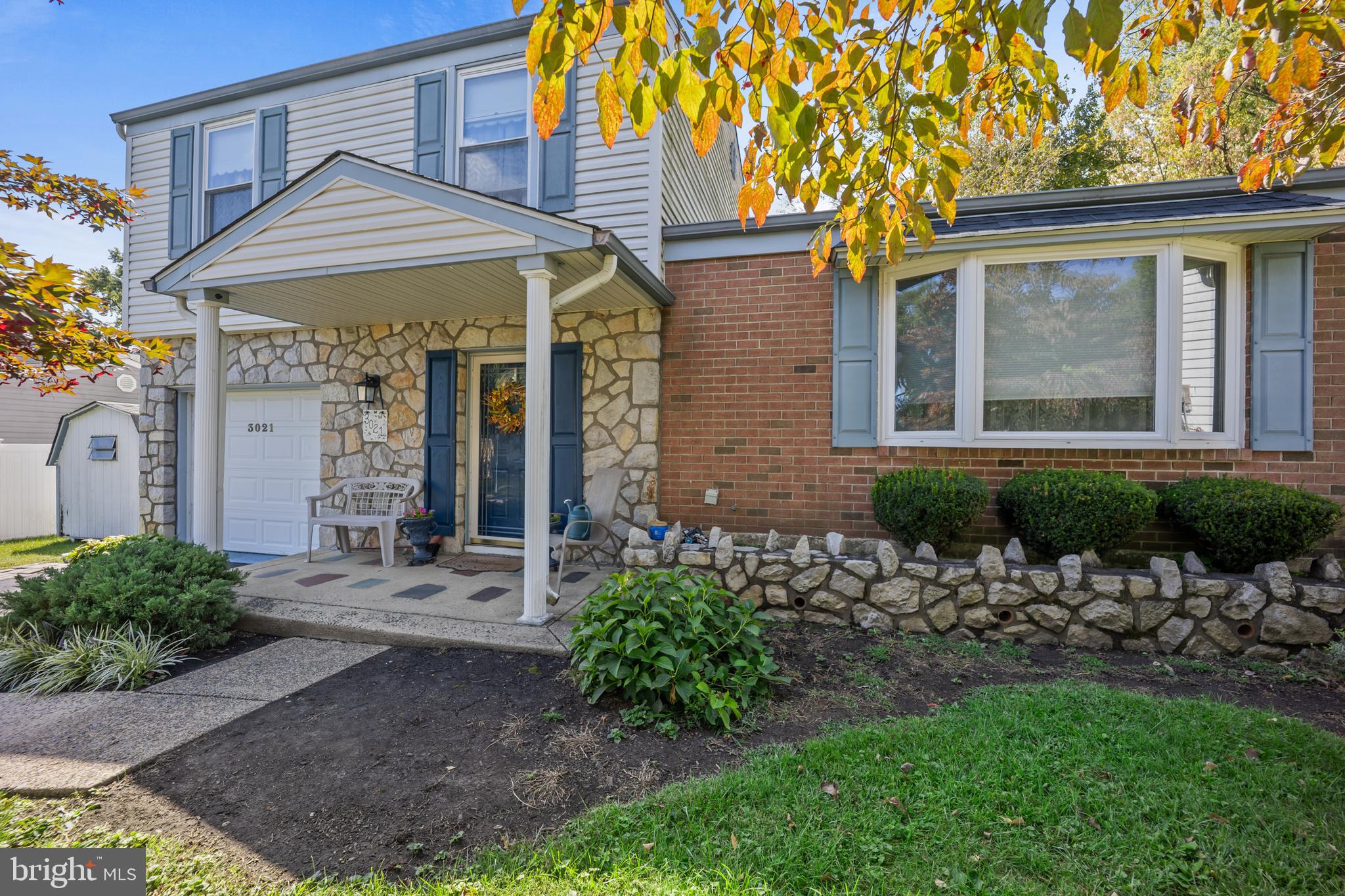 Very nice stone & brick front 3 bedroom 2.5 bath spilt in desirable Neshaminy Valley Section of Bensalem. Covered front porch. Florida room off kitchen is beautiful 21' x 12' Patio enclosure room. Patio enclosure has lighting, outlets & large ceiling fan. Five sliding doors makes this a great 3 season room. Plus 22' x 12' covered patio with high hat lighting. 6 foot wood privacy fence in rear yard. Plenty of relaxing outdoor living in this home. Front full glass storm door. Enter into large tiled foyer with oversized double closet. Walk into good size family room with double windows on back looking over covered rear patio. There is a powder room and access to tiled laundry room with tub. Large enough to hang cloths or iron. Laundry room has separate entry door so would make great mud room for returning in work or sport cloths. Access to garage that has been finished as room. Curently used for shortage but would make a nice home office or study. Could also be coverted to main level 4th bedroom if needed. Front foyer opens to large living room on the right. Large Living room area features very nice size bay window on the front. Living room opens to formal dining room with chair rail & custom chandlier. Kitchen is adjacent to formal dining room and has room for kitchen table. Modern kitchen with plenty of cabinets, gas oven & burners, built in mircowave and dishwasher. Living room & dining room have upgraded carpets and kitchen has custom 12 inch tiled floor. There is an Anderson Slider on back of kitchen that leads down to patio enclosure room.
There are also steps down to family room and laudry room level. Stairs off living room access upper level bedrooms & baths. The primary bedroom is very good size with 2 connecting double closets. There is a good size remodeled master bath. Very nice full glass corner shower with tiled walls. Nice size white vanity with matching one peice sink. Nice custom plank flooring. The 2nd bedroom is also a good size and has an oversized double closet. The 3rd bedroom is a good size and has an oversized single closet with a double door. The full hall bath is remodeled . Full size tub shower with matching surround. nice vanity with one peice sink. Tiled flooring in hall bath. There is attic access in upper level hallway. There is a brand new roof on the entire home. Gas burner and central air are less then 5 years old. Nice street in great area very close to major highways & shopping. Professiopnal pictures will be added prior to showings begininng this Saturday.