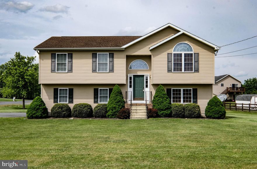 Wow, Just Wow!  Not Only Does This Cozy Home Sit On A Half Acre Lot, It Boasts So Many Cool Things!  Additional Parking Area For Camper Or Large Trailer, Flat Usable Lot On A  Corner Of The  Back End Of The  Subdivision! Entering The Home You Will Find Large Open Spacious Living Room With Cathedral Ceilings, Open Kitchen With Storage And Exit Out Onto The Deck Area. All Of The Flooring In The Home Has Been Replaced Within The Last 2 Years. All Rooms Are Oversized With Large Closets! The Main Level Has 3 Bedrooms And 2 Full Baths. The Lower Level Has A Large Rec Room With Exit Out Onto The Patio And Large Back Yard Area. The Garage Is A Side Entry And Oversized. Dont Miss This Wonderful Opportunity! Freshly Painted Kitchen Cabinets! Seller wants $5,000 for large shed in back, Washer Dryer and Chest Freezzer Do Not Convey