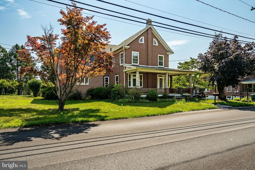 Welcome to 401 N Church Rd, Wernersville, where timeless elegance and historic charm await in this stunning Federal-style home. Nestled in a picturesque neighborhood, this residence seamlessly blends classic architecture with modern comforts.  From the moment you arrive, you'll be captivated by the stately façade and meticulous architectural details that define this period home.  Inside, high ceilings, original woodwork, and expansive windows bathe each room in natural light, creating a warm and inviting atmosphere. The grand living room, featuring a beautiful fireplace and ornate moldings, is perfect for entertaining guests. The formal dining room, with its classic wainscoting and chandelier, sets the stage for memorable dinners and celebrations. The chef's kitchen boasts modern appliances, including a double wall over and farmhouse sink, ample counter space, and custom cabinetry, providing everything you need to create culinary masterpieces, while a charming island offers a delightful spot for morning coffee. The spacious master suite, complete with a private bath and ample closet space, provides a luxurious retreat, and the additional bedrooms  share a newly renovated hall bath.   The property is set on a serene, tree-lined street with meticulously landscaped gardens, and ample outdoor space for relaxation and recreation. Situated in a desirable neighborhood, this home is just moments away from local amenities, shops, and restaurants, offering the perfect blend of modern living and historic charm. Don't miss the opportunity to own a piece of history with this remarkable Federal-style farmhouse at 401 N Church Rd. Schedule your private tour today and experience the timeless beauty of this Wernersville treasure.  Sale also includes Tax ID 49-4366-08-78-5678 , 403 N Church Rd, Wernersville, PA 19565-1305. This parcel is .24acres and contains an outbuilding for additional usage and room to grow.