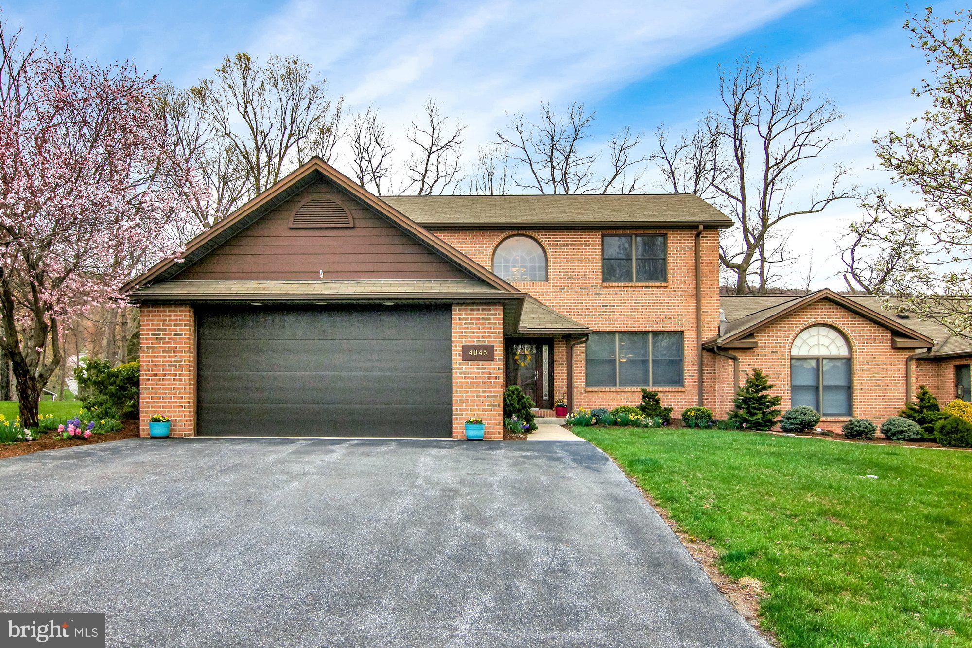 Rare opportunity to own a fabulously maintained condo in the sought after Stonegate community. This incredible home provides an open floor plan full of updates. The family room is the heart of the home with soaring ceilings, cozy gas fireplace, custom built-ins, skylights, and a double set of doors leading outdoors. The kichen is well equipped for a home chef with amenities like under cabinet lighting, lazy susans, spacious pantry, and a breakfast bar that is both welcoming and functional. A dedicated dining room is the perfect size to host family gatherings. Enjoy one-floor-living with a 1st floor primary suite complete with vaulting ceilings, walk-in closet, and an attached full bath with whirlpool tub, double sinks, and walk-in shower. Two additional bedrooms (each with a walk-in closet!) and a bathroom on the 2nd floor create the perfect space for your guests to relax. Head outdoors to experience private outdoor living! The Trex deck (2016) is a great place to enjoy the upcoming spring weather or choose to retire to the screened porch with outdoor carpet, Bose speaker system, and a cooling ceiling fan.You can enjoy the mature landscaping and quiet cul-de-sac location year-round! The Stonegate HOA is generous and offerings the chance at truly low maintenance living with the monthly fee covering big ticket items like roof, driveway, lawn care, snow removal, and even trash! No basement means no water issues! Additional highlights of this home include an upgraded security system (2020), 1st floor laundry, and a 2 car garage with amazing space for storage. This home is a joy to own!