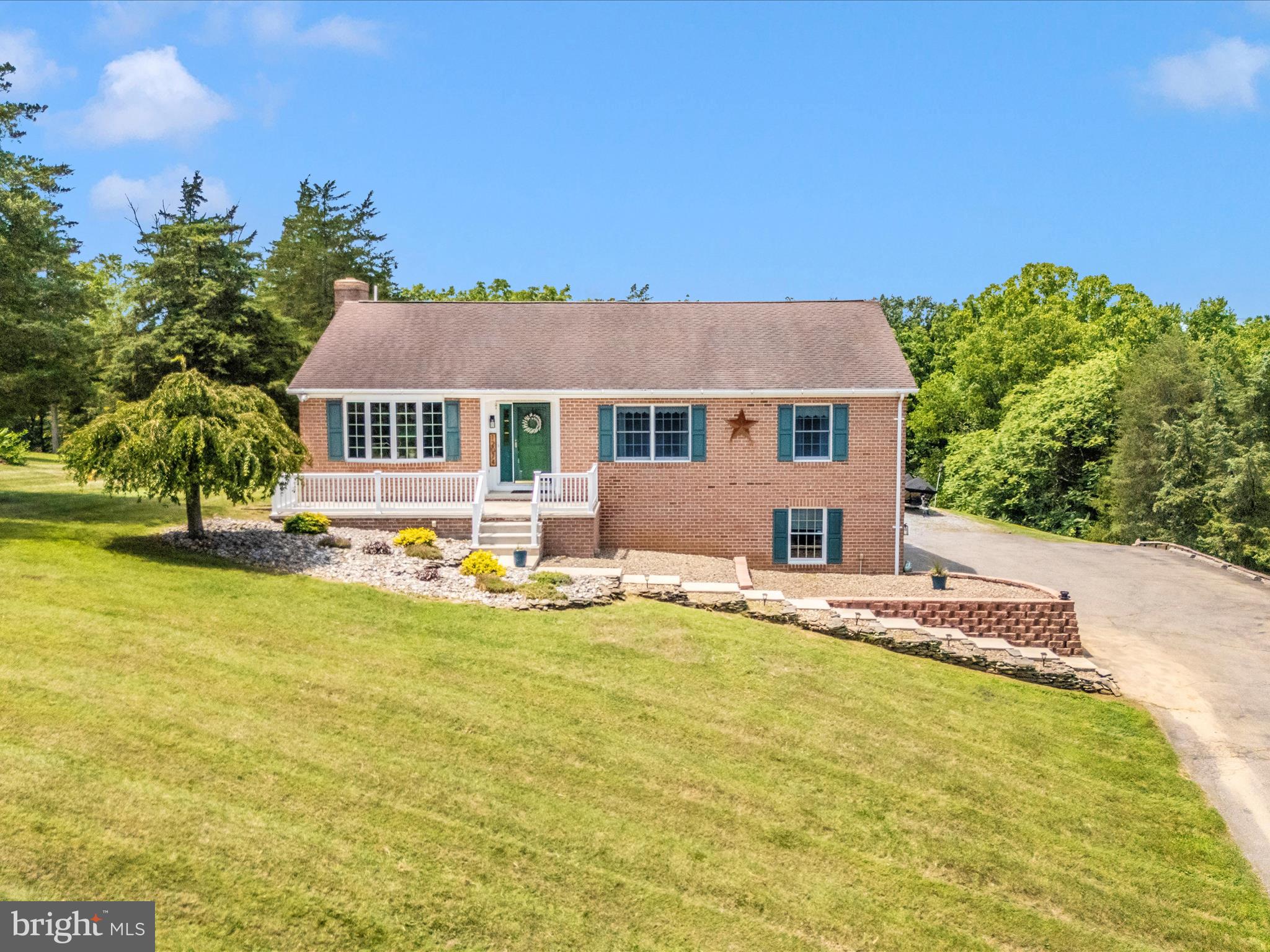 You don't want to miss this all brick rancher in the Williamsport / Clear Spring area on nearly 2 acres! Three bedrooms, two and a half baths including primary bedroom with updated ensuite bath, living room, dining room, eat in kitchen, main floor laundry, hardwood floors throughout, finished basement with gas fireplace, deck with a view!, THREE car garage, TONS of driveway parking, 12x20 storage shed with loft, HVAC replaced 2024! and the list goes on! Your own slice of heaven just waiting for you!