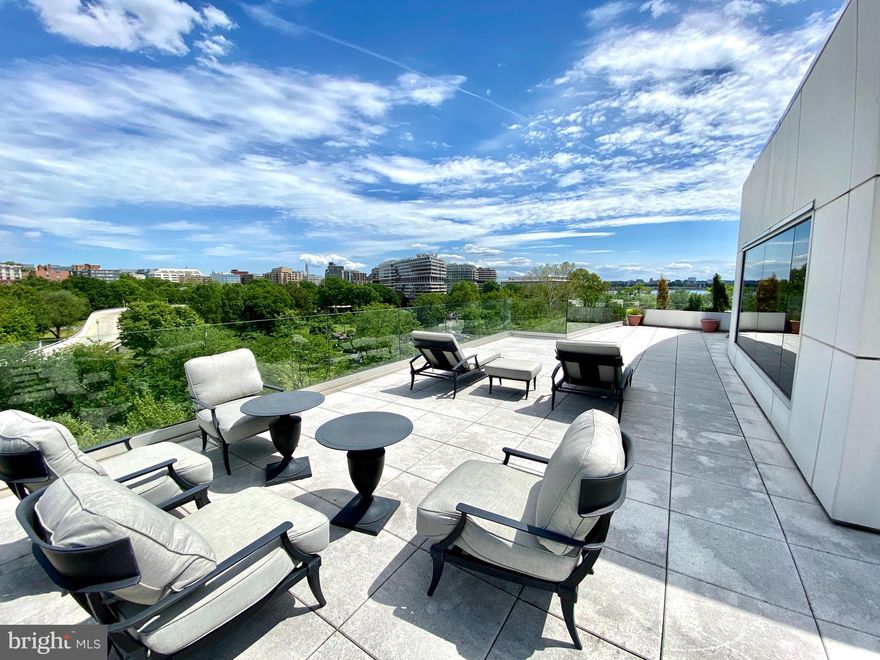 Stunning penthouse condo in Georgetown, steps to the Potomac River and Washington Harbor.  Over 4100 sq.ft of living space and 2500+/- sq.ft. of outdoor terraces on 2 levels with views down the Potomac River towards the Kennedy Center and Watergate.    The luxurious and open floor plan with walls of windows offers a gourmet kitchen with island, open living room with gas fireplace, dining room, long entry gallery perfect for artwork, high ceilings, hardwood floors throughout public areas on main floor, spacious master suite with two separate baths and two walk-in closets, 2 additional bedrooms with en-suite baths, powder room, and upper level family room.  3- car garage parking close to elevator, 2 storage rooms, powered shades though-out, 24 hour front desk and fitness center.  Utilities metered by building.  Check out the 3D rendering on our tour.