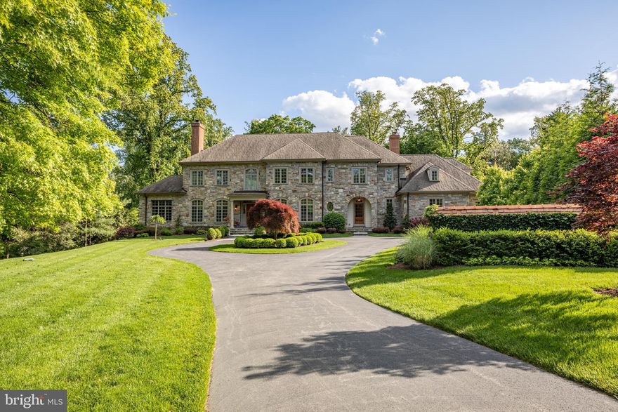 Approaching this magnificent 5 bedroom, 6.2 bath custom-built stone showplace in primeNorthside Villanova is an awe-inspiring experience, as the majesty & curb appeal take yourbreath away! Nestled on an exclusive private street in the sought-after estate section, thisgrand home was conceived by the renowned McIntyre/Capron adhering to the higheststandards of quality & design. Set on the grounds of the J. Kearsley Mitchell, Jr. estate sformer carriage house rests an exquisite new transitional-style jewel reflecting the classiccharm of yesteryear while oozing with contemporary luxury. Original carriage housefeatures & a reclaimed stone family room fireplace mingle with a modern open layout &premium finishes/amenities throughout, creating a warm, sophisticated ambience forunparalleled family living.The spectacular 1.44-acre property surrounded by estate fencing is parklike in its beauty,enhanced by lush landscaping, specimen plantings & stately trees. Gain access to yourprivate oasis via a long drive that transitions to circular once arriving at the residence.Inside you ll find all versatile space you ll need for family comfort & large-scale entertaining.Among the refined elements encountered upon entering the dramatic front-to-rear receptionhall are high vaulted ceilings, airy arched openings, elaborate crown moldings, rich oakwood floors & recessed paneled wainscoting. Perfect for hosting guests is the gorgeousliving room with custom built-ins served by a full wet bar nearby, punctuated by a uniquedouble-sided see-through gas fireplace shared with an adjoining office. A light-bathedsunroom with slate floor & stone accents extends out to a divine rear terrace for natureviews & sipping cocktails. Meals prepared in the top-of-the-line Kountry Kraft kitchen withWolf & Sub-Zero appliances for the chef are enjoyed in the formal dining room accompaniedby a well-appointed butler s pantry. Also off the kitchen sits a lovely breakfast room leadingto the terrace, inviting open family room with built-ins & fireplace, and tiled mudroomconnecting to the 3-car garage.Sleeping quarters are distinguished by a fabulous master retreat offering a spacious trayceiling bedroom, relaxing sitting room & spa-like en-suite bath. Four additional bedroomsincluding a large suite + a laundry room complete the 2nd floor. A 3rd story that can easilybecome extra living space & day-lit walk-out lower level with rec space, a gym, full bath &unfinished area heighten the allure. State-of-the-art technology includes a full-houseentertainment system. As appealing is the backup generator that can run the entire home inthe event of a power outage. Best of all is the convenient location near top schools, countryclubs, shopping, dining, the city & major routes.