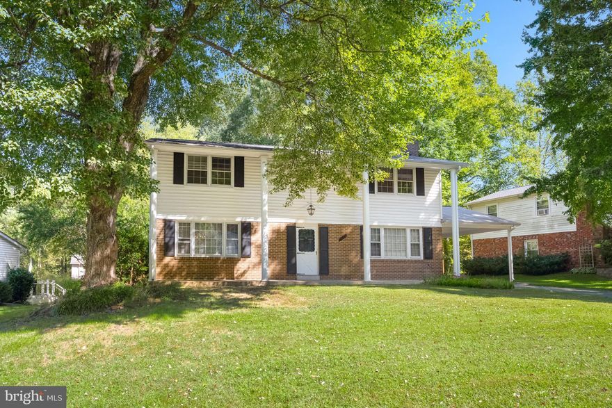 Wonderful four bedroom 3.5 bath Colonial home in great location--Fireplace in family room--updated kitchen with cherry cabinets,  corian counter tops, tile flooring and updated appliances--Finished rec room--great  backyard for entertaining--close to shopping-major roads and transportation