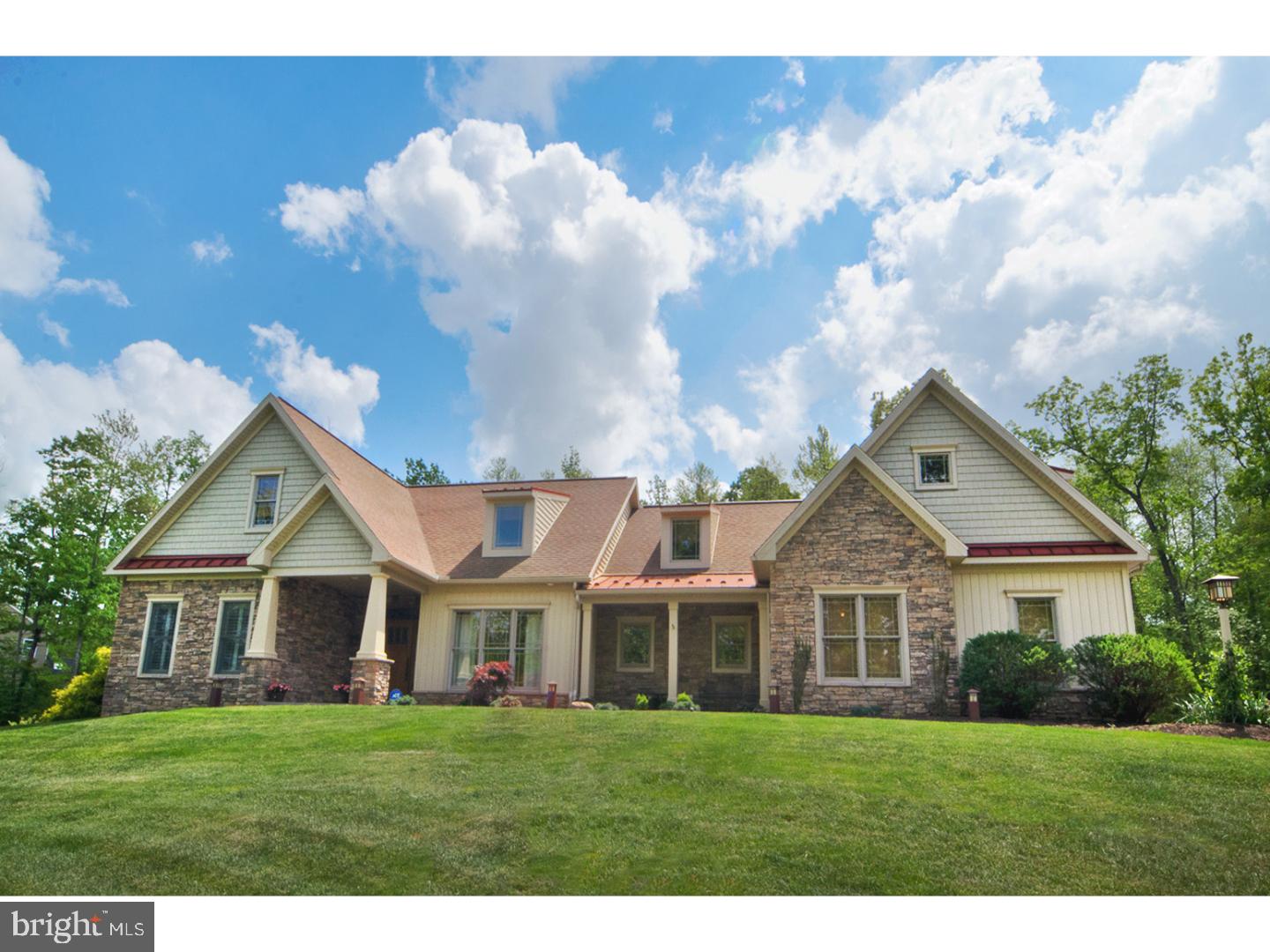 Every detail was thought of in this Custom Craftsman Style Home by Berks on 1.75 acres with Wooded Privacy. Many outstanding features in this home including a Gourmet Chef's Kitchen with Quarter Sawn Oak Cabinetry with Craftsman Details, 9ft Island, Quartz Countertops, Kitchen Aid Appliances, Convection Wall Oven, Gas Cooktop, Tiled Backsplash, Walk-In 10x6 Pantry with Pocket Door, Matching Butler Pantry with Bar Sink, Ice Maker & Built in Desk/Office Area. A step down Breakfast Rm off the kitchen has vaulted ceilings and a wall of windows overlooking the back yard with a Fronheiser Mountain Pond Heated Pool, Covered Patio and back woods. The home was built with dual Master Bedrooms that share a 13x10 Master Closet with Custom Cabinets but the current owners use one of the bedrooms as an Office. The Master Bathroom has Dual Vanities and a Large Walk-In Tiled Shower. Living Rm has Vaulted Ceilings with Tile Surround Gas Fireplace, Handmade Hearth and Oversized Mantel. Dining Rm has Craftsman Style Wainscoting, Arroyo Wall Sconces and Chandelier. Huge Laundry Rm off the garage with Cabinets for Storage and a Sink incorporated into the Countertop. Entire 1st Floor is Hardwood except for Kitchen, Breakfast Room and Laundry Room which is 16" Tile. There is also a special Powder Rm on the Main level with a treat for the men! The Second Level can be accessed from the Family Rm and Garage. It contains a Loft Area with Pool Table/Game Area, Family Rm with a wet bar and mini-fridge, a Den which could be a 5th bedroom and then 2 New Bedrooms and a Full Bathroom, Perfect for Entertaining and Overnight Guests! Need a Workshop? This home has one WITH a Bathroom! The 3rd Bay of the Garage has a Heated Workshop with Half Bath and access to the backyard as well. The Basement is unfinished, dry and ready for anything you need it to be. This Custom Home will not disappoint you so make your appointment today!