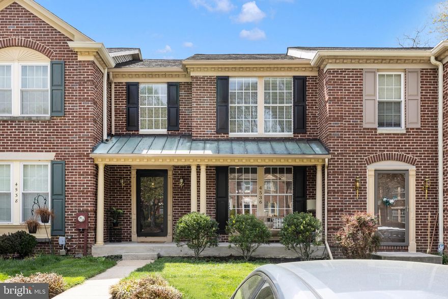 Move quickly to secure this stately brick-front townhome, complete with a charming front porch and tucked away on a quiet cul-de-sac. Thoughtfully updated throughout, this home features fresh paint and extensive renovations including a beautifully updated hall bath (2026), roof and skylights (2017), a fully renovated kitchen, water heater (2011), a high-efficiency Carrier hybrid HVAC system (2010) and new lighting throughout the home.  The main level offers a welcoming foyer, updated half bath, formal dining area, and a step-down living room designed for both comfort and entertaining. A large pass-through from the kitchen enhances the open flow between spaces, while crown moulding and a wood-burning fireplace with custom mantle add warmth and character.  Newly installed luxury vinyl plank flooring extends through the main living spaces, while tile accents the foyer, kitchen, and half bath.  A brand-new sliding door leads to a freshly stained, expansive deck overlooking a flat backyard and large open green space.  The outdoor setting is a standout feature—ideal for play, gardening, or simply enjoying the view. Mature landscaping includes dogwood, ornamental plum, honeysuckle, lilac, golden ragwort, and peonies. While the yard can easily be fenced, the current owners have enjoyed the open feel and direct access to community green space, often used for soccer, baseball, and neighborhood gatherings.  The fully renovated kitchen blends style and function with warm birch 42” cabinetry, quartz countertops, and a striking aqua recycled glass tile backsplash. Ceramic tile flooring, recessed lighting, stainless steel appliances, and abundant natural light complete the space.  Upstairs, you’ll find three bedrooms and two full baths, including a spacious primary suite with vaulted ceilings, a private en-suite bath.  The primary bath offers a 60” vanity with quartz countertop, updated fixtures, and a skylight that fills the space with natural light, creating a bright, spa-like retreat complete with a soaking tub.  The walk-in closet is exceptional, featuring over 12-foot ceilings and provides a unique opportunity to customize an expansive wardrobe space.  The recently renovated hall bath features a double blue vanity, updated lighting, dual mirrors, LVP flooring, and a new toilet. The finished lower level provides excellent flexibility with a full bath, large laundry and utility room with ample storage, and additional living space perfect for a recreation room, home gym, or office.  Ideally located in the sought-after Village of Dorsey’s Search, this home offers exceptional access to community amenities and outdoor recreation. Just two blocks away, the Dorsey Hall pool features a beach-entry wading pool with water features and a slide, an eight-lane main pool, sand volleyball, a tot lot, and basketball courts. The nearby village center—only a few blocks away—offers convenient shopping, dining, and seasonal outdoor concerts. Minutes from the home, Centennial Park, Fairway Hills Golf Course, Meadowbrook Athletic Complex, and Long Gate Playground provide endless opportunities for recreation. Centennial Park is a true highlight, featuring a scenic lake, boat and pavilion rentals, fishing, ball fields, picnic areas, basketball and tennis courts, and more. As part of the Columbia Association, residents enjoy access to over 3,600 acres of open space, 94 miles of pathways, and numerous tot lots throughout the community.  Downtown Columbia offers shopping and dining at The Mall in Columbia, along with a vibrant arts and entertainment scene including Toby’s Dinner Theatre and Merriweather Post Pavilion.  Residents can also enjoy free outdoor concerts and events at Lake Kittamaqundi. Commuters will appreciate easy access to major routes including 29, 100, I-70, and I-95. This prime location offers the perfect blend of convenience, community, and lifestyle that Columbia and Ellicott City are known for!