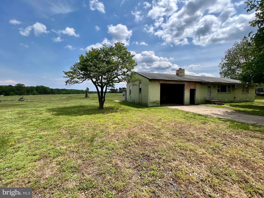 Investor Special!!  Looking for a flip? this could be it ,1728 SQF and a 2 Car Garage All Cinderblock Construction , Seating on Over Half of an ACRE Lot with a view of Farm Land 3 bedroom 1 bath home in Colonial Beach  Property is being sold “AS-IS”  WHERE IS .and if-is, with all faults and without any warranty, either expressed or implied HOME  INSPECTION FOR  INFORMATION PURPOSE ONLY .Only 35 Minutes to Dahlgren ,35 Minutes to Bowling Green /A.P. Hill ,and under a Hour of Driving to Fredericksburg. Easy access to Maryland via Harry Nice Bridge .Located in the boating community of Placid Bay Estates a Friendly Golf Cart Community with/optional Voluntary HOA fee includes the use of Boat Ramp, Community Center, Picnic grounds and access to fresh water lakes and a Fishing Pier and Access to Potomac River via Mattox Creek