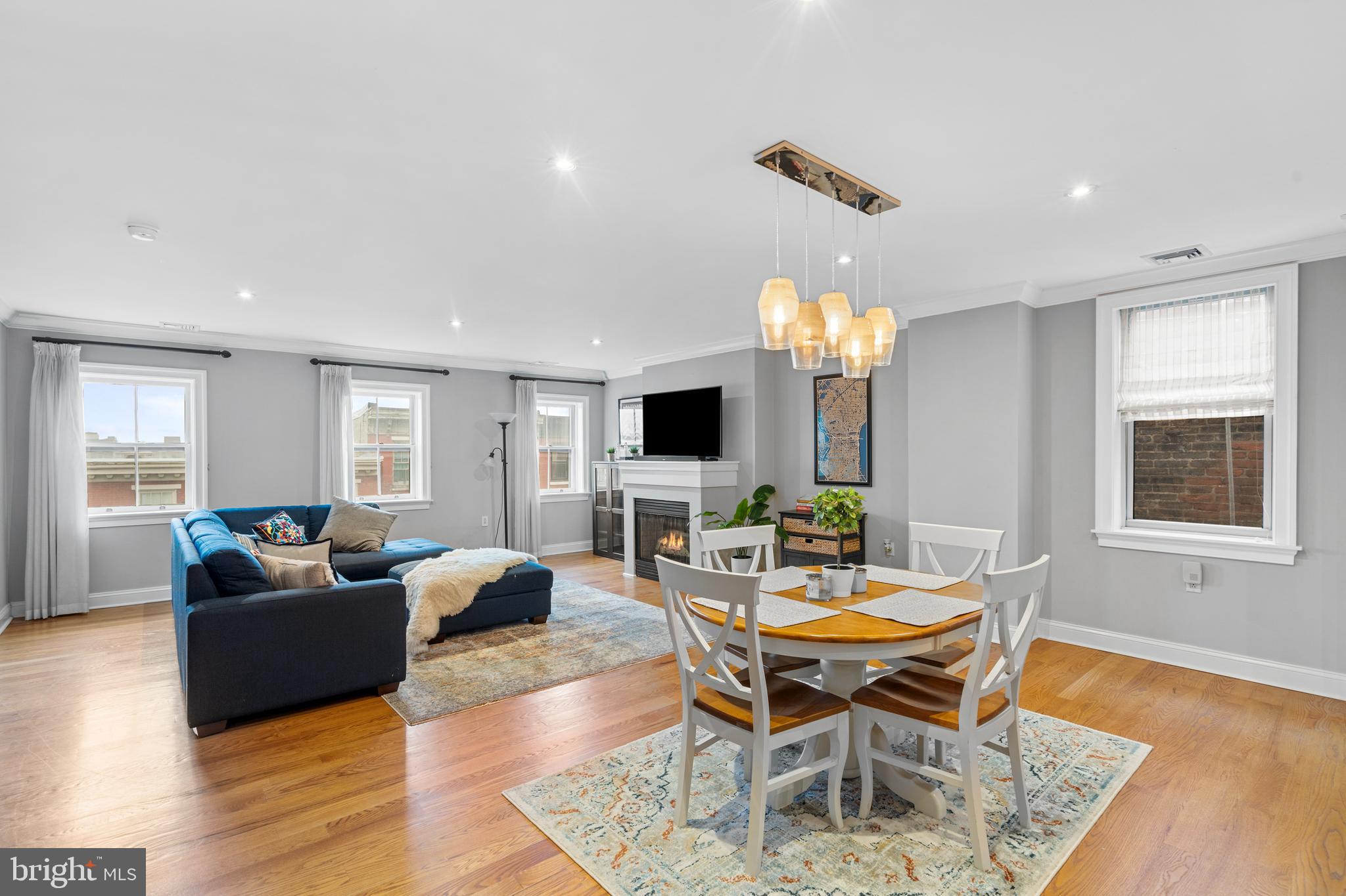 Been searching for good vibes?? Exuding warmth and brightness, we welcome you to the penthouse unit in the historic Spruce Street boutique building that was once The Philadelphia Music Academy. The building’s historic facade, entry, and staircase are reminders of its original grandeur, while the unit’s updated kitchen and baths, hardwood floors, wide open layout, recessed lighting and central AC provide all the essentials for modern comfort. The wide open living space offers incredible opportunity for entertaining friends before a night out on the town, and the kitchen with its high-end appliances and ample prep area will be all you’ll need to prepare. The front bedroom is spacious and bright with dual closets and South-facing windows. More closets lead to the full bath with oversized vanity, glass-enclosed shower, soaking tub with tile surround, and skylight. The second bedroom has plenty of additional closet space and a custom Murphy bed. But the true showstopper here is the giant terrace with 360 views of the surrounding Philadelphia skyline, possibly no finer privately-owned rooftop expanse in the city. (No need to take our word for it, we invite you to come see for yourself.) Offering plenty of storage, a convenient half bath, brand new HVAC system, and the finest view in the city, Unit 400 has all the vibes you’ve been searching for. We welcome your visit!