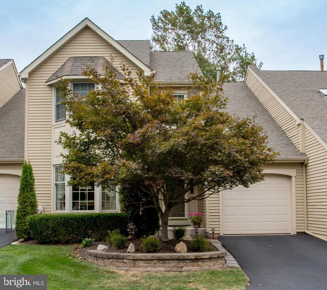 Tucked at the end of a quiet court in Meadow Ridge, this 3 bedroom, 2.5 bath Guidi-built townhome backs to a wooded area for privacy and serene views. Known for its low turnover, Meadow Ridge offers a rare opportunity to purchase in a neighborhood where homes are seldom available.
Offering nearly 2,000 sq. ft. above grade plus a finished 740 sq. ft. lower level with wet bar, this 3-bedroom, 2.5-bath home is designed for both entertaining and everyday living.
The heart of the home is the kitchen, where a central island is accented by pendant lighting. Granite overlay countertops and a tile backsplash give the space a modern touch, while the open layout flows naturally into the breakfast area and family room. Recently refinished hardwood floors from the foyer tie it all together, creating a warm and inviting atmosphere perfect for both daily living and entertaining.
The family room is highlighted by a brick fireplace with gas insert, while the bright living room at the front of the home features a charming bay window. A first-floor powder room adds convenience. The outdoor living space off the rear of the home is a highlight: a large deck with a brand-new retractable awning (2025) overlooks a peaceful wooded backdrop, making it perfect for relaxing or entertaining.
Upstairs, the primary suite boasts a double-door entry, walk-in closet, and a private bath with large vanity, soaking tub, and separate shower. Two additional bedrooms share the hall bath, including a third bedroom with its own walk-in closet. Laundry is conveniently located on this level.
The $243/month HOA covers exterior building, lawn maintenance, trash, common area maintenance and streets/common area snow removal for easy, low-maintenance living. Located in New Britain Township, Meadow Ridge offers quick access to shopping, dining, and commuter routes, all within Central Bucks schools.
Don’t miss this chance to own a well-cared-for home in a prime court location with wooded views in one of Chalfont’s most established communities.