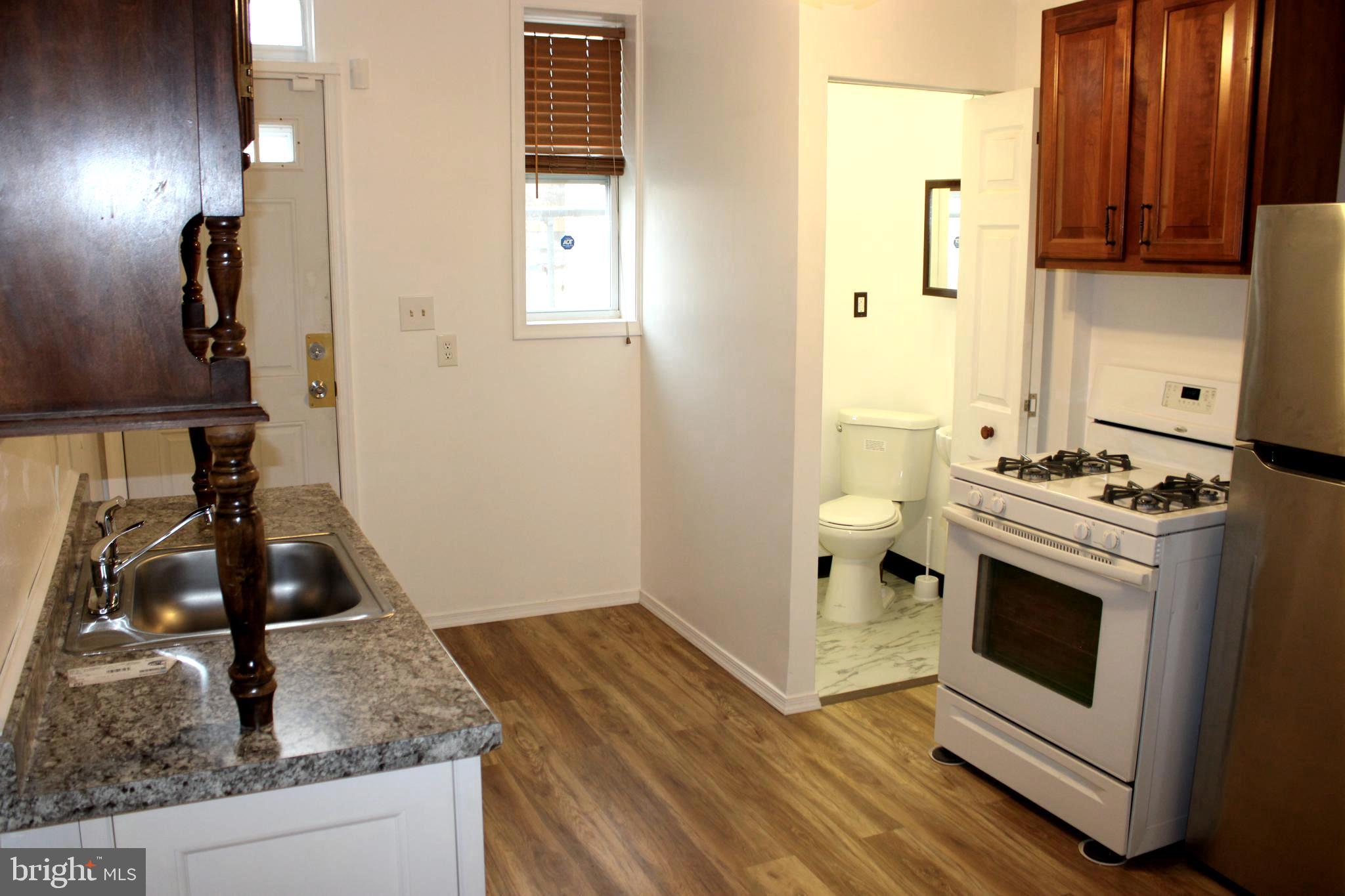 ******BUYER UNABLE TO PERFORM****** FHA Appraisal supporting value is on file. This beautifully renovated 2-bedroom, 2.5-bathroom townhouse in Baltimore City is a must-see. Featuring brand new windows, doors, a roof, and modern appliances, this home offers both comfort and style. The spacious layout includes two cozy bedrooms and two and a half well-appointed bathrooms, providing plenty of space for everyday living. Just steps away from Highlandtown Elementary School, it’s an ideal location for families. The fully paved backyard provides the added bonus of off-street parking, offering convenience and security. Move-in ready, this townhouse combines modern updates with an unbeatable location.