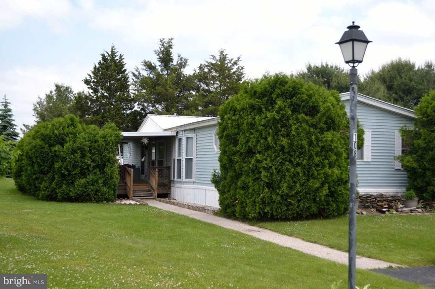 Amazingly Well Maintained Home located on possibly the best lot in the community!!! Featuring: 10 X 40 Covered Deck, Shed, Off St. Parking for 2 cars, Front & Back Entrance's. Large Dining Room & Living Room, Front Bed Rm with double closet, Built-ins and Hall Bath access, Master Suite with 2 closets, Built-ins, & a Walk In Closet, Master Bath. Oven/Range & Refrigerator included!!! Gas Heat and Central Air Conditioning.