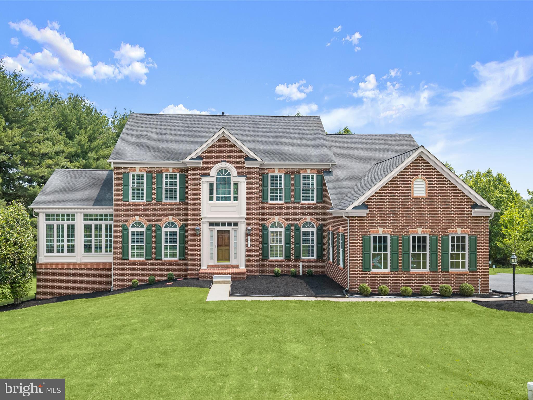 Exquisite Colonial in Prestigious Hall Shop Manor – Over 5,500 Sq Ft on a Private 1.37-Acre Lot
Welcome to 6905 Westcott Place—an elegant 5-bedroom, 4.5-bath custom colonial set on a serene cul-de-sac in one of Clarksville’s most sought-after communities. Nestled on a supremely private lot, this stately NV home stately offers over 5,500 square feet of refined living space, including a fully finished full daylight walk-out lower level and a spacious 3-car side-entry garage.
A private drive a lush green lawn escorts you to the front porch with timeless curb appeal and a brick facade where a grand two-story entry greets you. Inside, a curated architectural interior includes rich hard wood floors, crown molding, and abundant natural light. The open floor plan on the main level begins with formal living and dining formals that flank the central foyer. The living room opens to a quintessential NV conservatory where light streams in through three walls of windows crowned with transoms.
The extended foyer unfolds into a gourmet kitchen with a gas cooking station, granite tops, entertainer’s island, walk-in pantry and a peninsula breakfast bar. The peninsula transitions to a light-filled breakfast room with an atrium door that invites gatherings large and small to dine alfresco on an expansive rear dining deck. Guest will meander back inside to refresh a festive beverage at the butler’s service bar and head into the adjacent open plan family room to enjoy a game day visit in front of the gas fireplace,
A secondary back stair rises up from the family room to an upper landing where you'll find four generously sized ensuite bedrooms, including a luxurious owner’s suite with spa-like bath and abundant walk-in closet spaces that will accommodate any wardrobe. The finished lower level offers a fifth bedroom, full bath, recreation space with a pair of full daylight walk-out atrium doors, and an additional unfinished area ideal for storage, gym, or future customization.
This idyllic location is zoned for top-ranked Pointers Run Elementary, Clarksville Middle, and Atholton High School, and is just minutes from vibrant Clarksville amenities, commuter routes, shopping, and dining. Come home to a lifestyle of curated luxury on over 5,500 SF on a private 1.37-Acre lot in Howard County, Maryland.