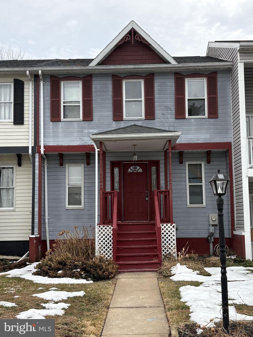 Great opportunity to build equity in this 1990 Kenly Square townhome! Perfect for an investor seeking a rental property or a homeowner ready to add value with a little sweat equity. The main level features a spacious living room, dining area with access to the deck, a full kitchen, and a convenient half bath. Upstairs, you’ll find two nice sized bedrooms, both with walk-in closets, along with a full bath. The partially finished basement provides additional living space and could easily serve as a third bedroom, home office, or rec room. Walk-out access leads to the rear patio and yard. Sold strictly "as-is' but major systems have been updated, including the roof, gas Trane heater, central air, and water heater — offering peace of mind on the big-ticket items. While the home could obviously benefit from some TLC, fresh paint and new flooring would go a long way in transforming this space. Priced to sell, this is a fantastic opportunity.