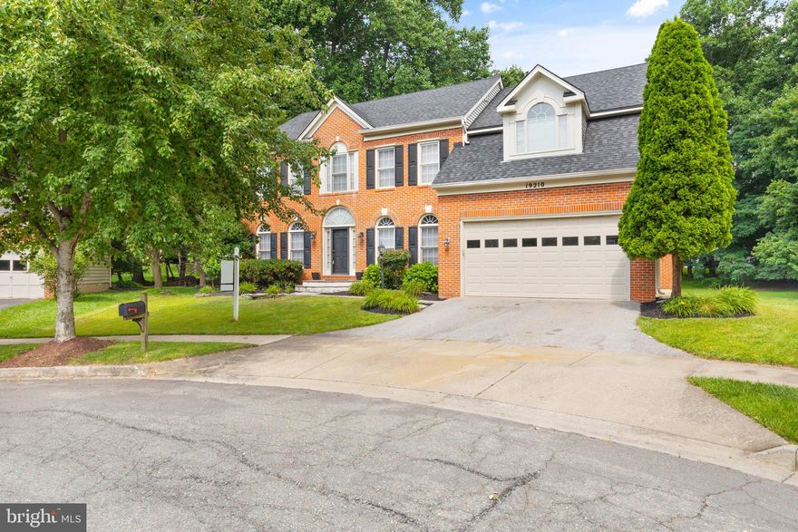 This is the ONE you've been waiting for.  Welcome Home to 19210 Honeystone Pl located in the highly desirable Brookeville community of Gold Mine Crossing. This beautiful brick front Colonial features a 2 car garage, 4 bedrooms/4.5 baths with almost 5,000 sq ft of living space, situated on a private cul de sac. Enter into a stunning two-story foyer with a multi level staircase. To your right is home office with french doors and to your left is the formal sitting room and dining room with chair rail and bay window. Passing through the large footprint kitchen, enjoy a cozy fire in the  family room with ample windows, making this room the  perfect gathering space.  

Enjoy quiet evenings on the deck over looking your flat tree lined rear yard oasis.  Don't miss the upstairs and retreat into your spacious owner's suite with a walk-in closet, multi room fireplace, and private bath featuring an oversized soaking tub and a nice walk in shower.  There are three additional bedrooms on this level and a hall bath with double vanity. The 4th bedroom features a fully equipped en suite with a tub/shower, vanity, and toilet.  The tastefully finished walkout basement with ceramic floors features a large open entertainment space, HUGE BUILT IN BAR, and an additional rooms perfect for a home gym, theatre, etc..  Additionally, there is another  full bath! Close to the Community park with playground and basketball court at the end of the street.