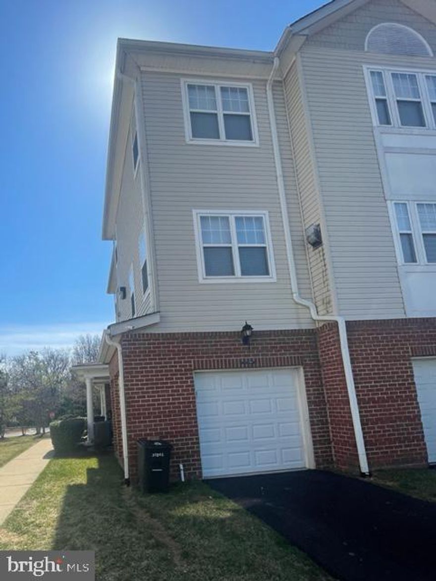 This is beautiful renovation. updated gourmet kitchen with white cabinets, granite counter tops, custom backsplash. New appliances, All new carpet and fresh paint throughout. 2 spacious bedrooms on the third level with two full updated baths. .This is a must see!!! Attached garage on the main level!!This is a must see!!!