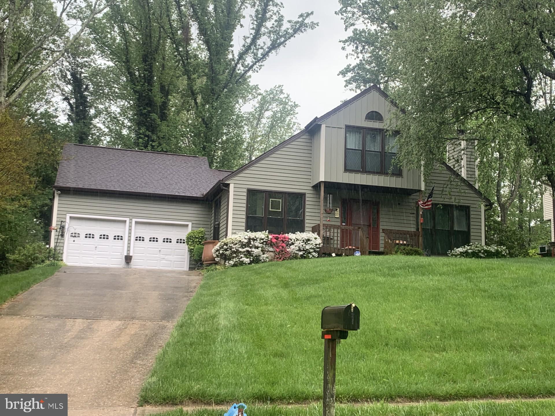 Unique and wonderful contemporary in the popular Hollyberry Woods neighborhood. Beautiful and private backyard and quiet cul-de-sac setting. Many updates - kitchen updated, roof 9 years old, siding 2 years old, windows 2012, freshly painted. Skylights add extra light. Finished basement with bedroom, full bath, rec room and "bonus" room.