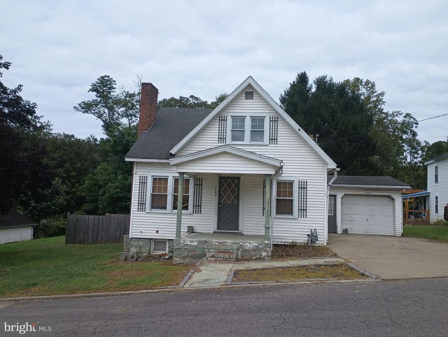 3BR / 1BA home on .23 Acre.  Attached garage,  Back porch.  Full basement.  Hardwood floors and fireplace.