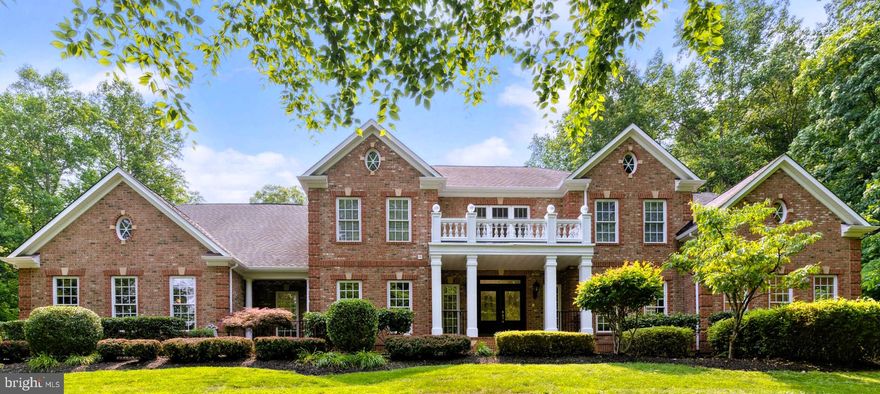 THIS HOME IS STUNNING THROUGHOUT! DEFINITELY, A MUST-SEE!  MOVE-IN READY.  Located in the Christy Estates subdivision. Luxury quiet community in Stafford among rolling hills, open fields, and winding roads. The homes are attractive and sit on uncluttered 3+ acre lots. Pride in home ownership and community spirit is exemplified.  Easy access to I-95, HOV & fast lane, VRE, and commuter lots. Central Park and Fredericksburg.  This Stately 8000+ sq ft brick colonial home with 6 beds and 8 baths sits high on a flat hilltop overlooking the cul-de-sac, winding asphalt driveway, and solar-powered brick entry columns. It is a site to be seen with or without the inground Sprinkler system on. A driveway large enough to turn around and + additional parking. The decorative lighted columns are appreciated for nightly functions.   Notice the professional landscaping and the serenity of this wooded lot.  Turn on the porch and take in the view again, enter through the double mahogany doors into the massive 2-story foyer. The openness, curved stairs, modern chandelier, and gleaming hardwood floors draws a smile.  Start your Tour!  Main level - Formal affairs, family functions, and just relaxing. The space and set up to do it all. Concerts in the spacious sunroom. Formal living room to impress.  A dining room large enough for family, friends, and guests. (Think Thanksgiving). A window office (with French doors, and great views) for working at home. (Work here only!) The professional chef’s kitchen with Decor appliances is too detailed and must be seen. Walk-in pantry. Granite countertops and a center aisle with seating. Large and open with the adjoining morning room and 2-story family room and views to the massive and professionally well done back yard, decks, patio, and pool.  This is the gathering hub. Enter the mudroom from the garage, closet on the left, and a ½ bath ahead.  Hardwired security and Alarm systems + doors (for pool), active Intercom system, Smart Thermostats, high speed Xfinity internet and home Central Vac system. Upper Level - 4 suites with ceiling fans, new carpet, and walk-in closets. Laundry with cabinets, sink, and stone tile. The breath-taking primary suite is spacious with a tray ceiling, fan, dimmable recessed lights, private dressing room with chandelier, double walk-in closet, primary bath with separate his and hers granite sinks, tray ceiling, dimmable chandelier lighting, recessed lights, water closet, updated walk-in shower with shower heads, body sprays, and hand shower, a jacuzzi whirlpool spa tub with a hand shower, and surround stone tile.  Watch a movie with a glass of your favorite wine or a cold drink from the walk-thru cellar to lounge in the sitting room. A Netflix and popcorn affair. Turn on the toasty fireplace with your remote for those chilly lights. Be mindful of binge-watching here (you will never leave). Lower Level -Basement - Roughly 2,000 Sq Ft of finish space. 4 flex spaces and adequate storage.  Large In-law suite with recessed lights, full bath, separate shower, sitting area, and full windows for natural lighting to brighten any person’s day. A 6th bedroom with ½ bath. The large recreation room seats six at the bar/kitchenette with stainless steel sink, recently installed dishwasher, fridge, and hanging pendants. A gas fireplace with a remote. Ideal for pool, games, and entertainment. The Park – This is the “OASIS” of backyard living. Professionally done. A custom heated in-ground pool (27’x18’ and runs 3.5’ to 9’ deep).  Attractive hardscape, retaining walls, cement patios, and maintenance-free decking. The lawn is mainly flat and mature. Enclosed by surrounding trees and fencing providing optimum privacy. Large cherry trees provide shade to the main deck.  Home warranty + pool/septic & transferrable Roof warranty.  House is freshly painted, with certified prep work Septic, HVAC, Termite + more, original owners.  MOVE-IN READY!