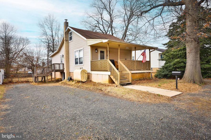 Step into this charming and updated bungalow, perfectly nestled in Croydon Heights, just a short stroll from the serene Delaware River. This delightful three-bedroom, one-bath home blends modern updates with classic charm, offering comfort and style in every corner. From the moment you arrive, the inviting front covered porch welcomes you—a perfect spot to enjoy your morning coffee. Inside, the spacious living room boasts rich hardwood flooring, recessed lighting, and a warm, welcoming ambiance. The updated kitchen is a true highlight, featuring cherry wood cabinetry with a sophisticated cappuccino finish, gleaming granite countertops, soft-close drawers, and a deep stainless-steel sink—all designed for both beauty and functionality. The breakfast bar provides additional seating, making it an ideal space for casual dining or entertaining. The full three-piece bath is tastefully updated with tile flooring and a tub-shower combo with an elegant tile surround. Two generously sized main-floor bedrooms offer ample closet space, while the third bedroom on the second floor provides privacy and versatility—ideal for a home office, guest room, or retreat.
Additional highlights include six-panel doors throughout, a fenced-in backyard for outdoor enjoyment, and a prime location just minutes from the Delaware River—offering the perfect balance of convenience and tranquility. Don’t miss the chance to call this beautifully maintained home your own!
