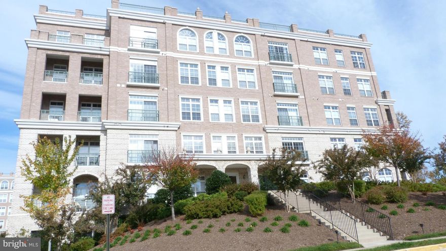 Enjoy watching the change of seasons from the balcony of this Belmont Bay condo.   Freshly painted this unit is ready for new tenants.  Open floor plan makes it easy to spread out.  Create a formal living room on one side & casual space in front of the fireplace on the other side.  Two primary suites are perfect for a roommate or privacy for guest. One assigned garage parking space.  Check out the rooftop building deck with views of the Occoquan river.    Enjoy the waterfront walking paths,  Easy access to commuter rail to DC,  Express Lane entrance one I-95 with in 2 miles & 10 miles to Ft Belvoir.