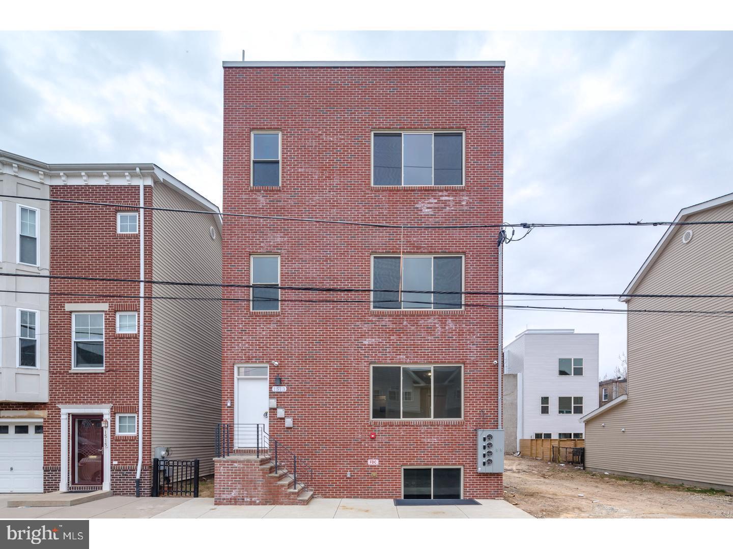This is a dramatic 26 foot wide, newer 2 bedroom and 2.5 bath, bi-level condo. With approximately 2400 square feet, the living room and finished basement are almost too big and the 10 ft ceilings make it feel even larger! Enjoy choosing which space you'd like to entertain in or convert the basement to a third bedroom! Open living room and dining room overlooked by custom kitchen with designer cabinets, stainless appliances, quartz counters and tiled back-splash with a larger slider out to the backyard. Both bedrooms are spacious with great closet space and lots of room for furniture. The master suite has a fantastic bathroom with all 4 walls tiled from floor to ceiling and walk in glass shower. Both bathrooms are designer quality. This home also features in-wall speakers throughout with 2 additional outdoor speakers, smart home thermostat, designer lighting, front door video intercom, security system, tiled lower level floors, washer/dryer and much more. As an added bonus, the owner will leave the pool table, kitchen table and basement TV! Schedule your tour today!